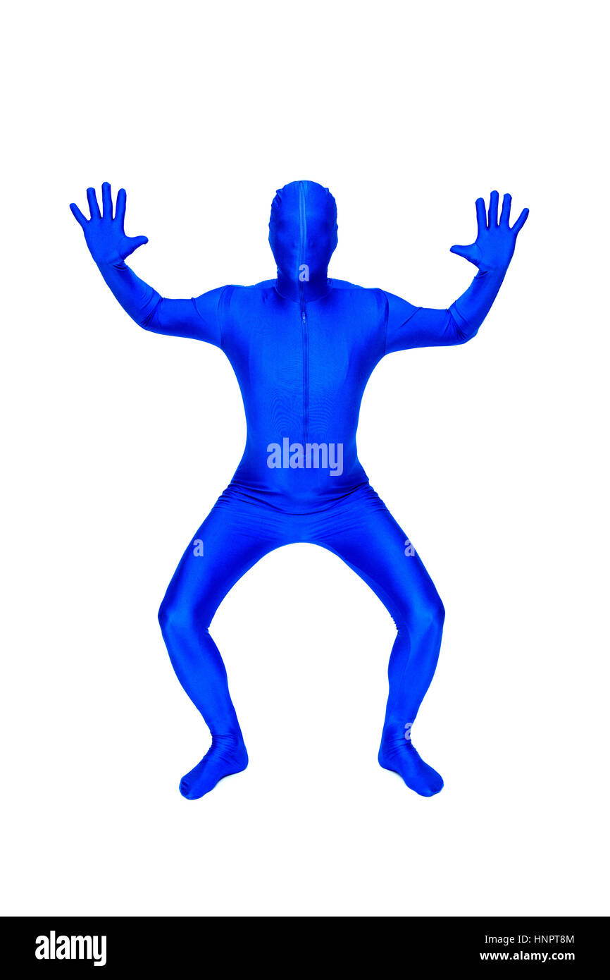 Misterioso uomo blu in morphsuit gesti con le mani Foto Stock