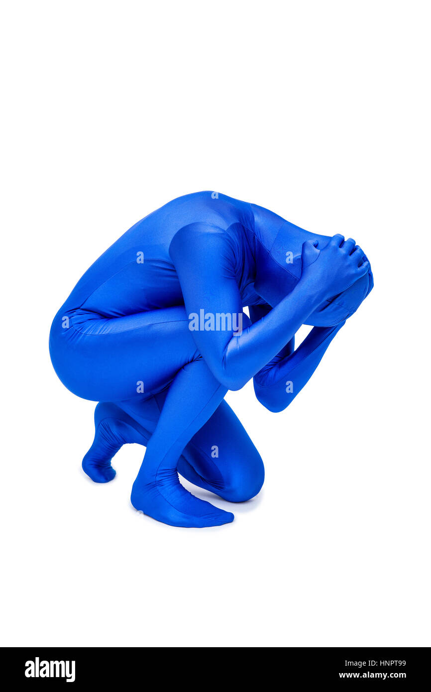 Misterioso uomo blu in morphsuit gesti con le mani Foto Stock