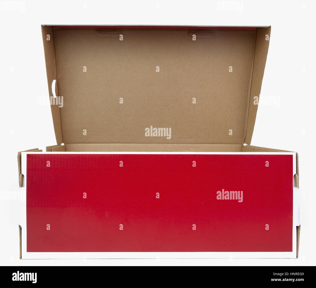 Il bianco e il rosso scatola da scarpe con il coperchio aperto. Foto Stock