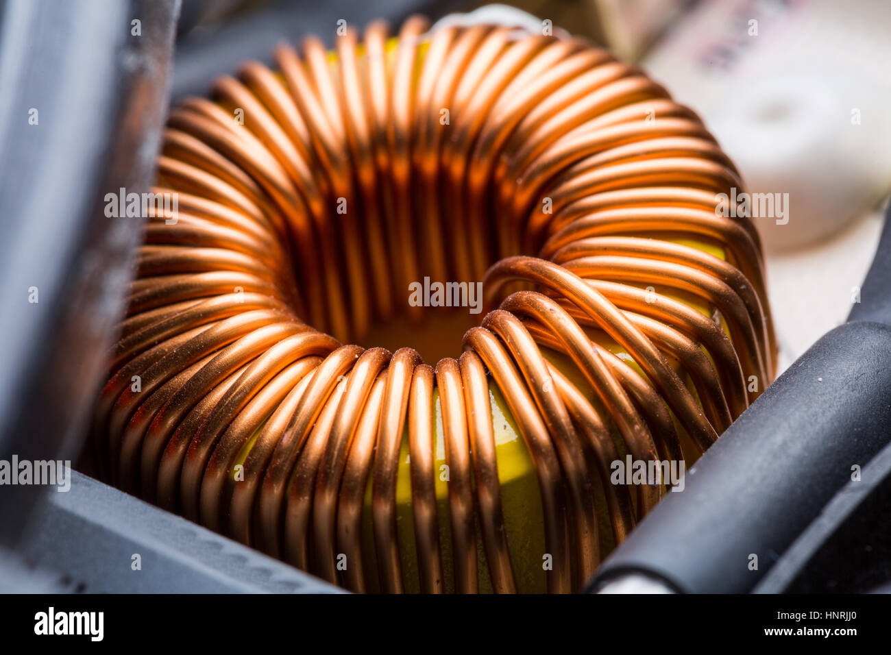 Trasformatore elettrico della bobina di rame closeup. Componente elettrico  Foto stock - Alamy