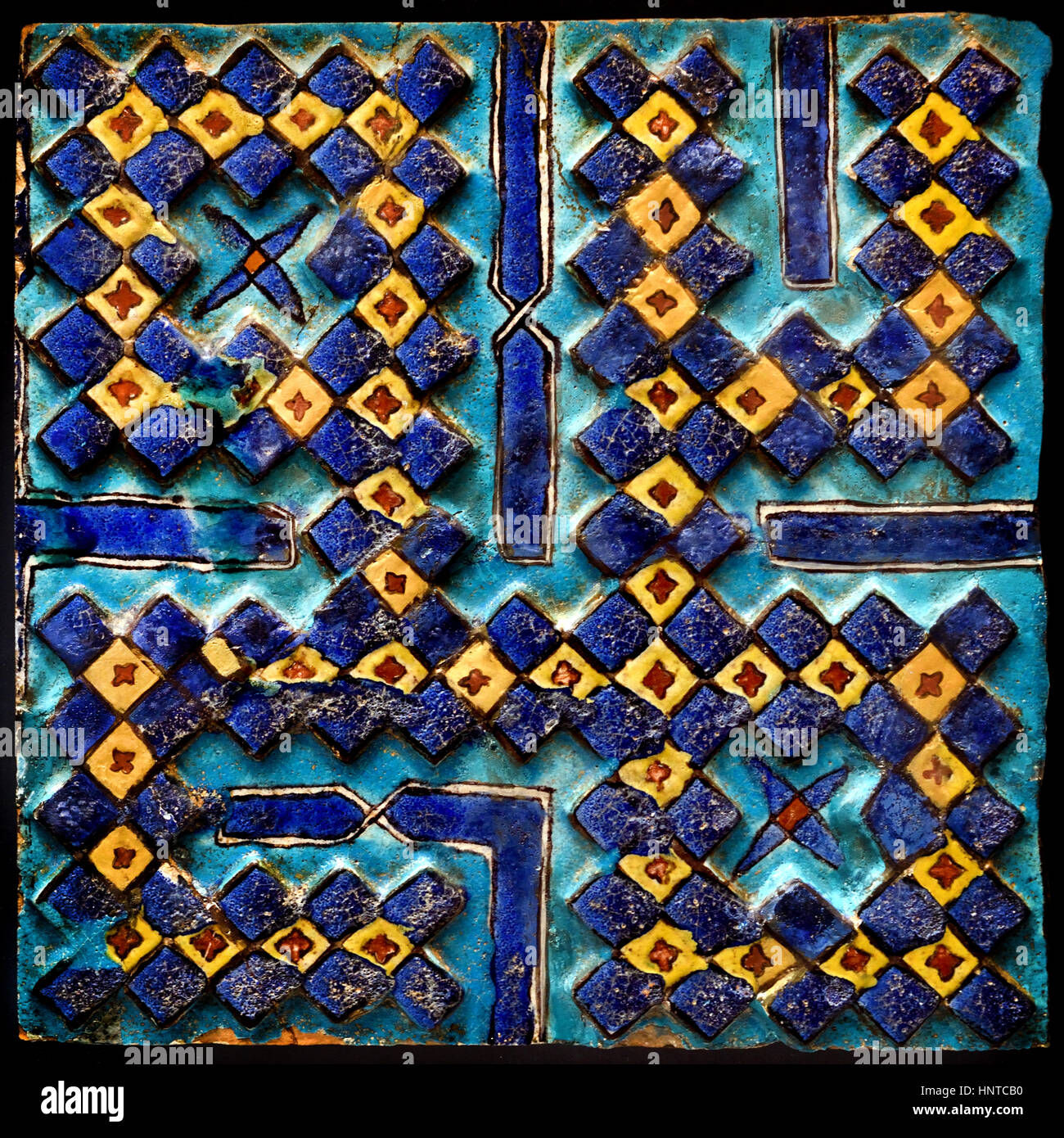 La scrittura di piastrella con il nome del Profeta Maometto in piazza casella. Uzbekistan ( Smarkaland ) dal portale del mausoleo del principe timurid Amir Zade (quarzo ceramiche) underglaze pittura . 1386 Foto Stock