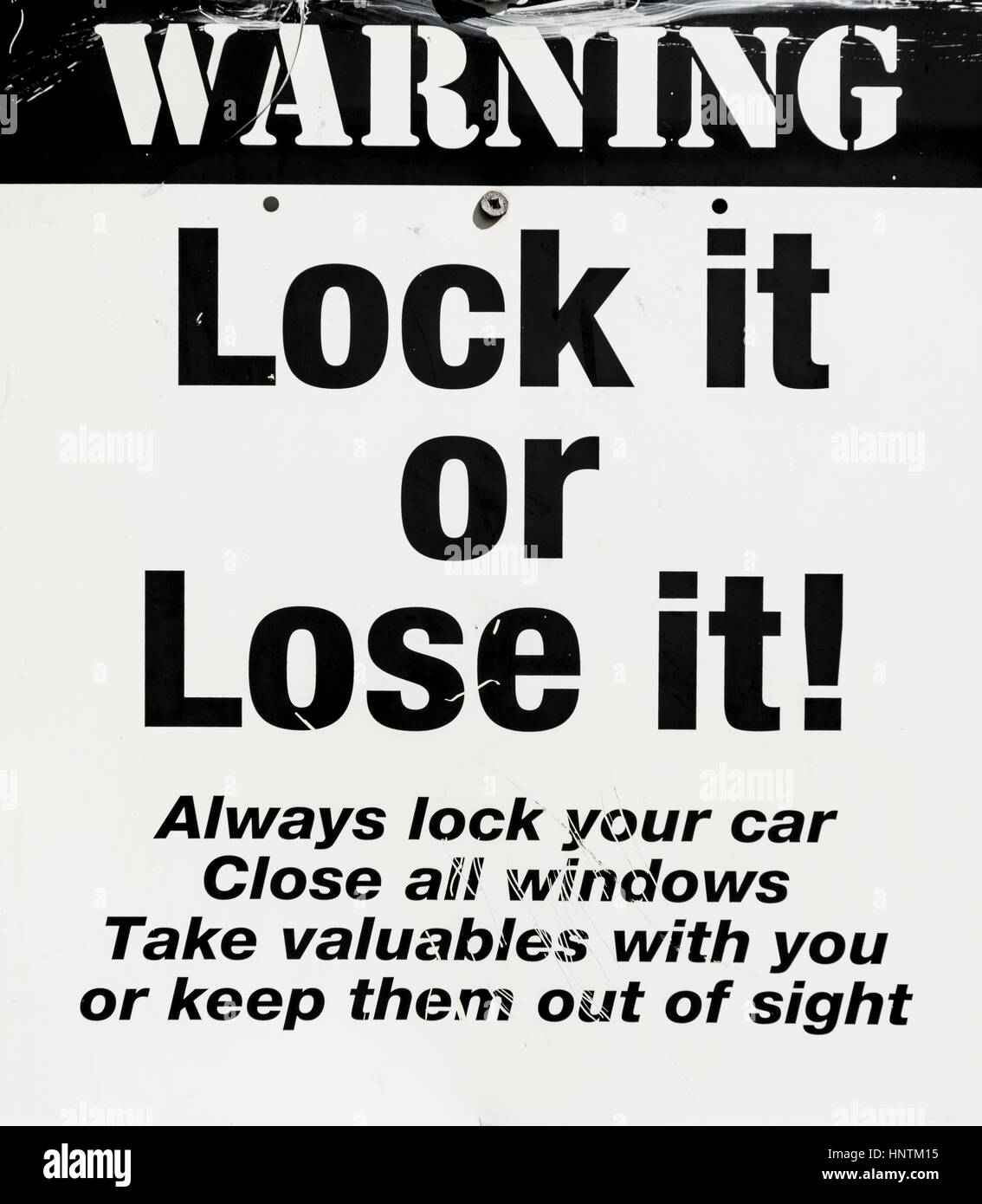Segnale di avviso, bloccarlo o perderlo, il furto di auto, avvertimento contro i ladri, Nuova Zelanda Foto Stock