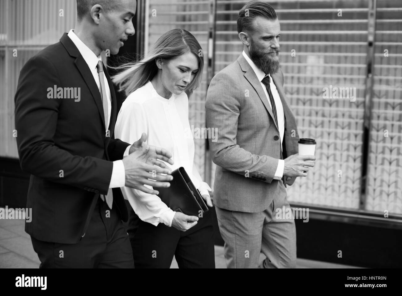 Gli imprenditori parlare Uomini Donne Notebook Foto Stock