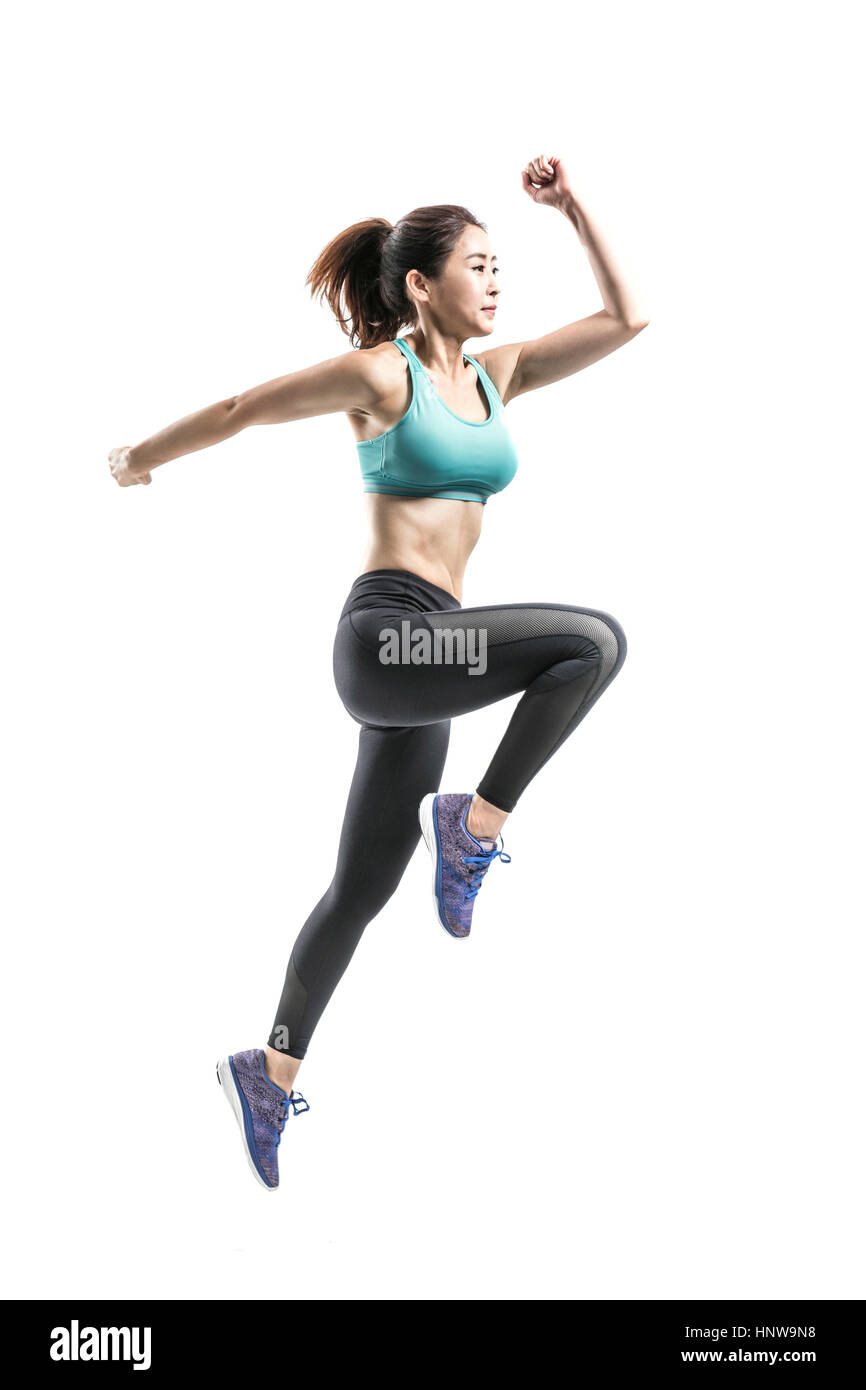 Donna in sportswears in esecuzione Foto Stock