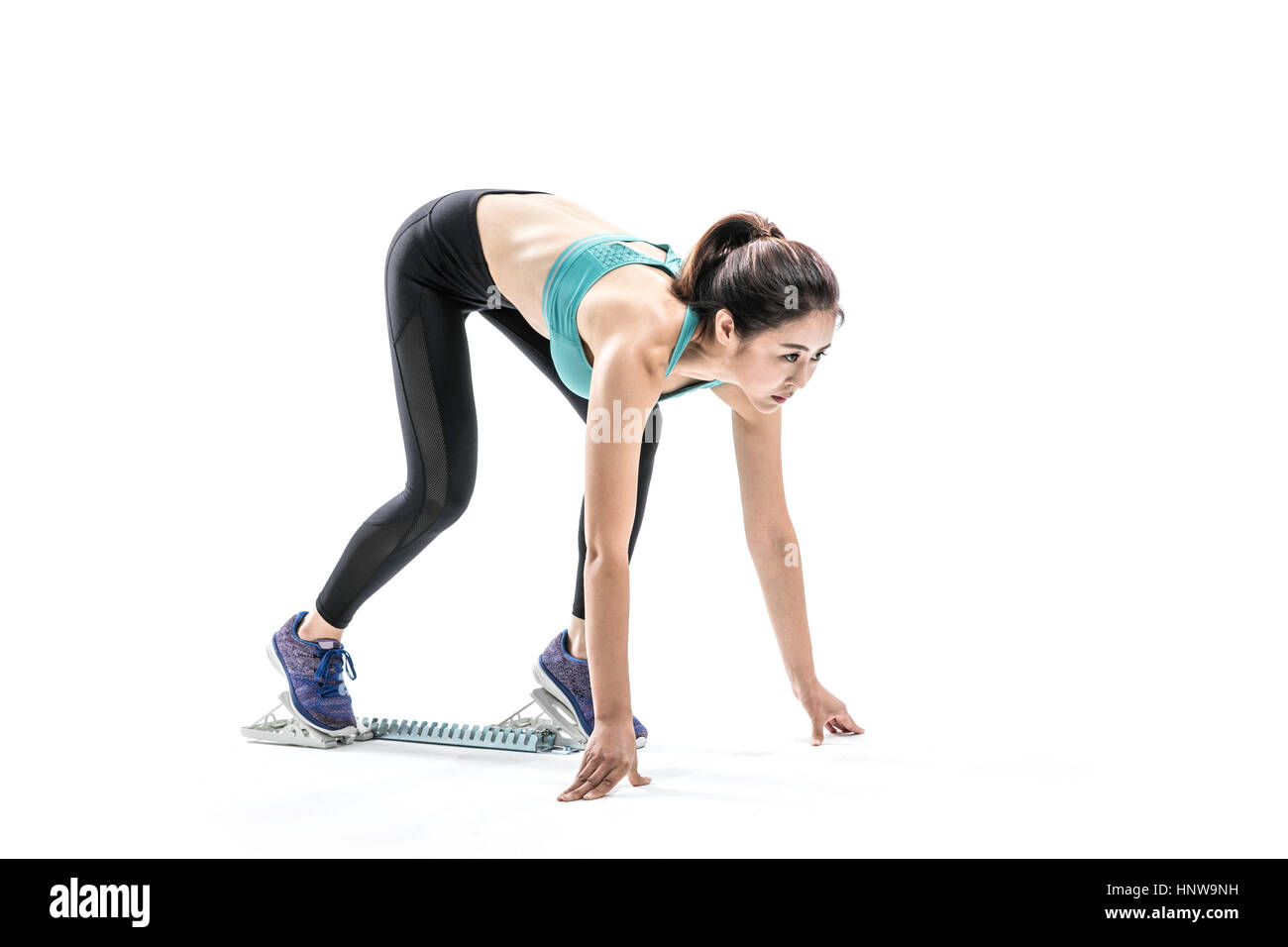 Atleta femminile pronto per essere eseguito Foto Stock