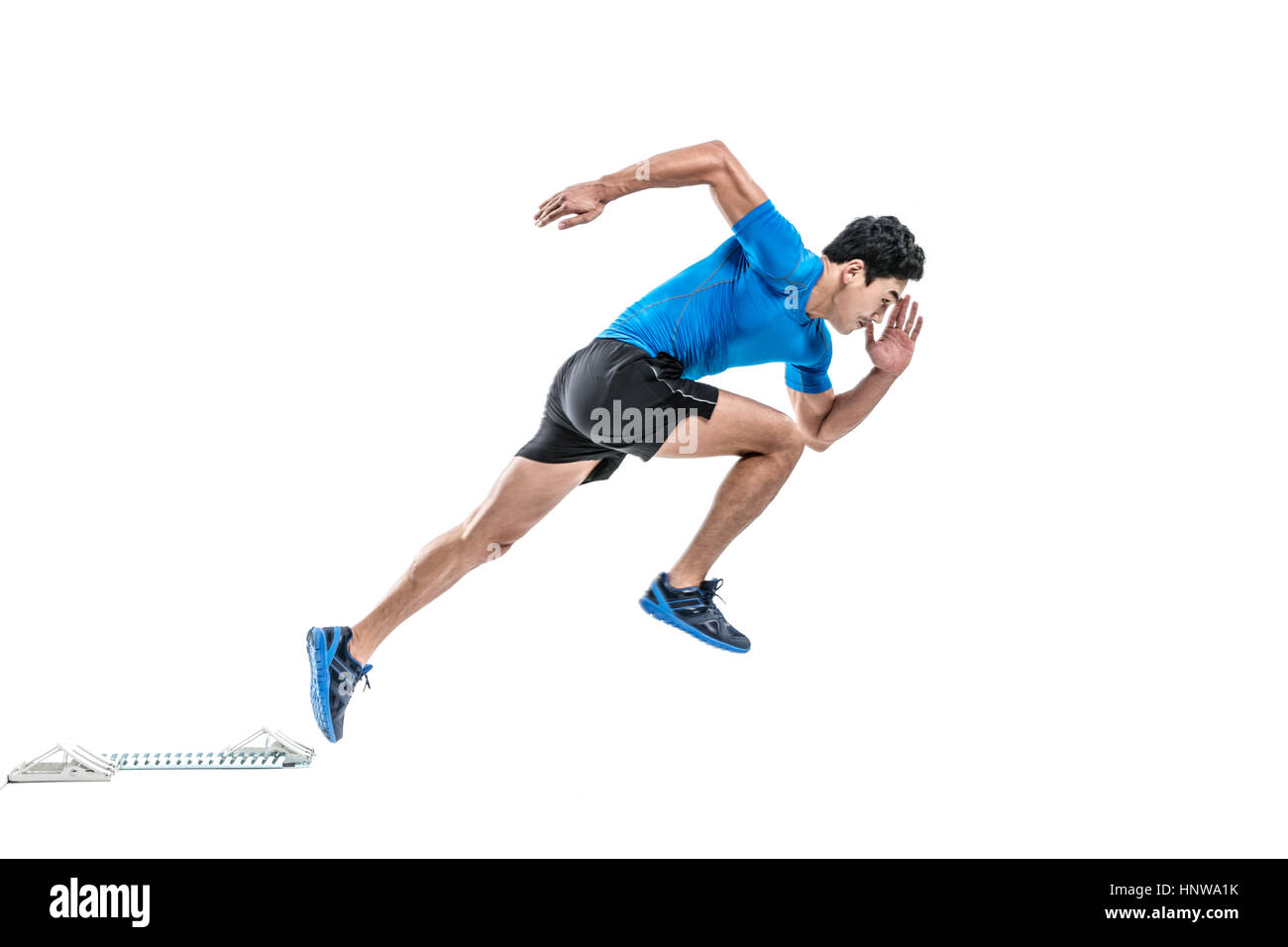 Dinamica atleta maschio in esecuzione Foto Stock