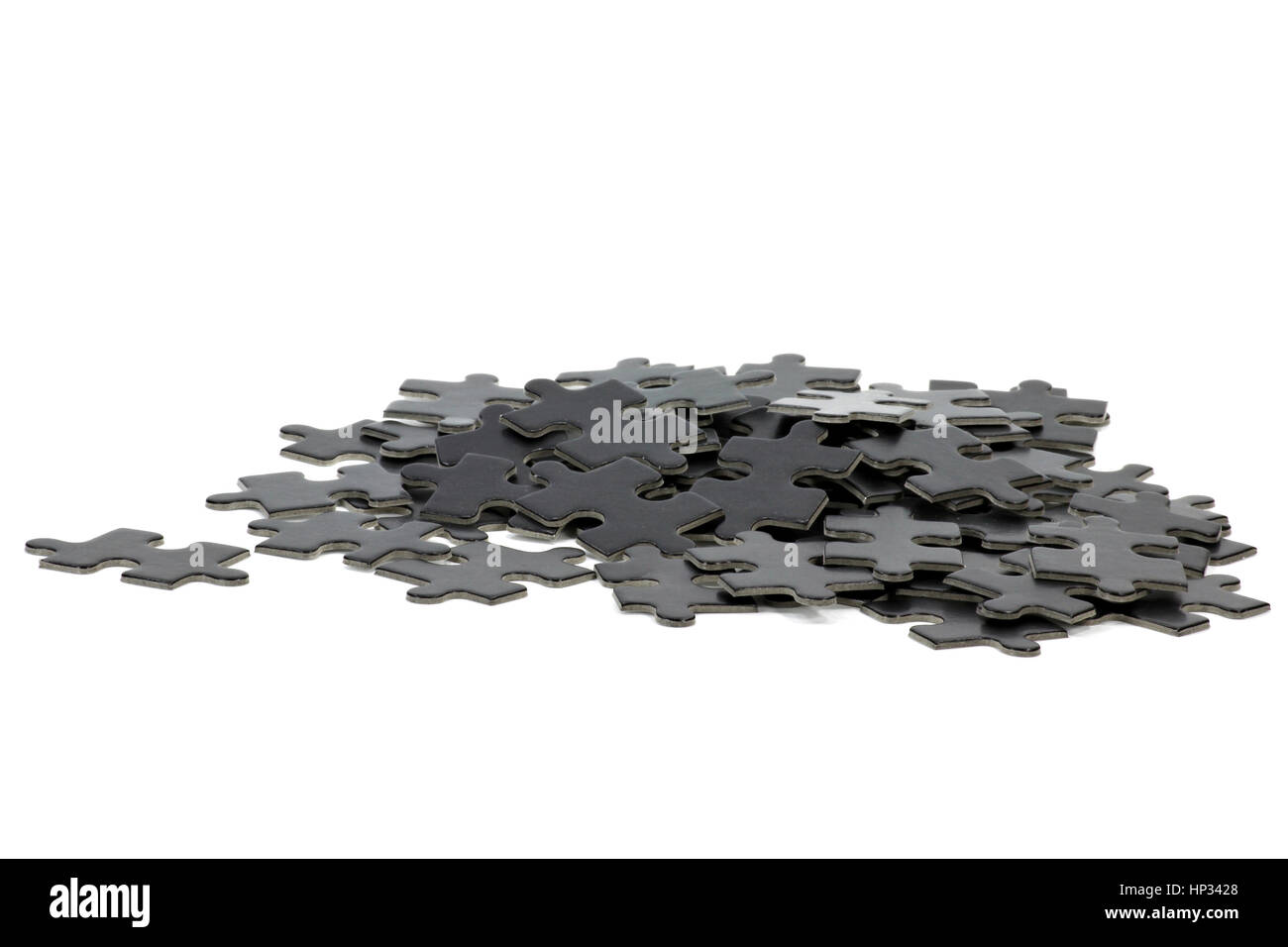Pezzi di un puzzle isolati su sfondo bianco Foto Stock