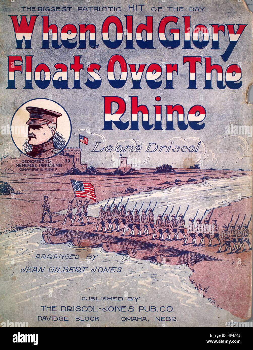 Foglio di musica immagine copertina della canzone 'Quando la vecchia gloria galleggia sul Reno il più grande hit Patriottica del giorno', con paternitã originale lettura delle note "Leone Driscol disposti da Jean Gilbert Jones", 1918. L'editore è elencato come 'l'Driscol-Jopnes Pub. Co.', la forma della composizione è 'strofico con chorus', la strumentazione è 'pianoforte e voce", la prima linea recita "Oh ma non riesci a sentire i cannoni boom?', e l'illustrazione artista è elencato come 'A.D. Bruno". Foto Stock