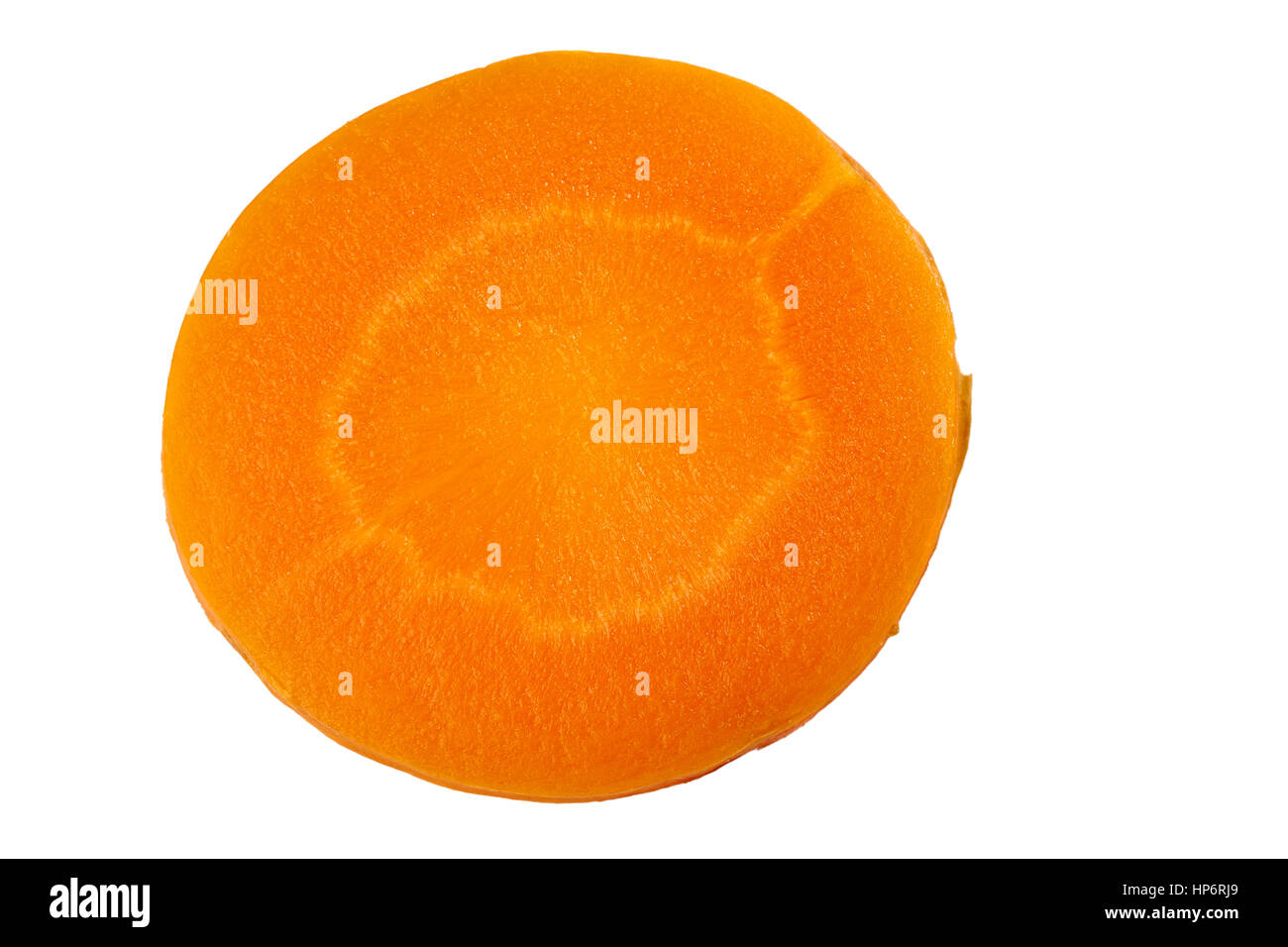 Round fetta di carota su bianco Foto Stock