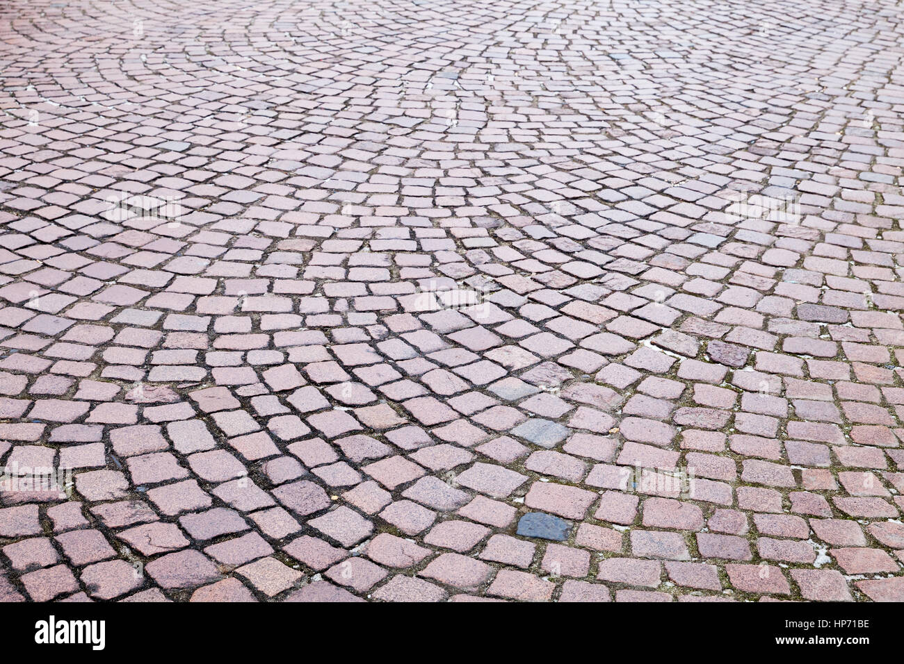 In ciottoli di granito pavimentazione stradale pattern. Foto di sfondo texture Foto Stock