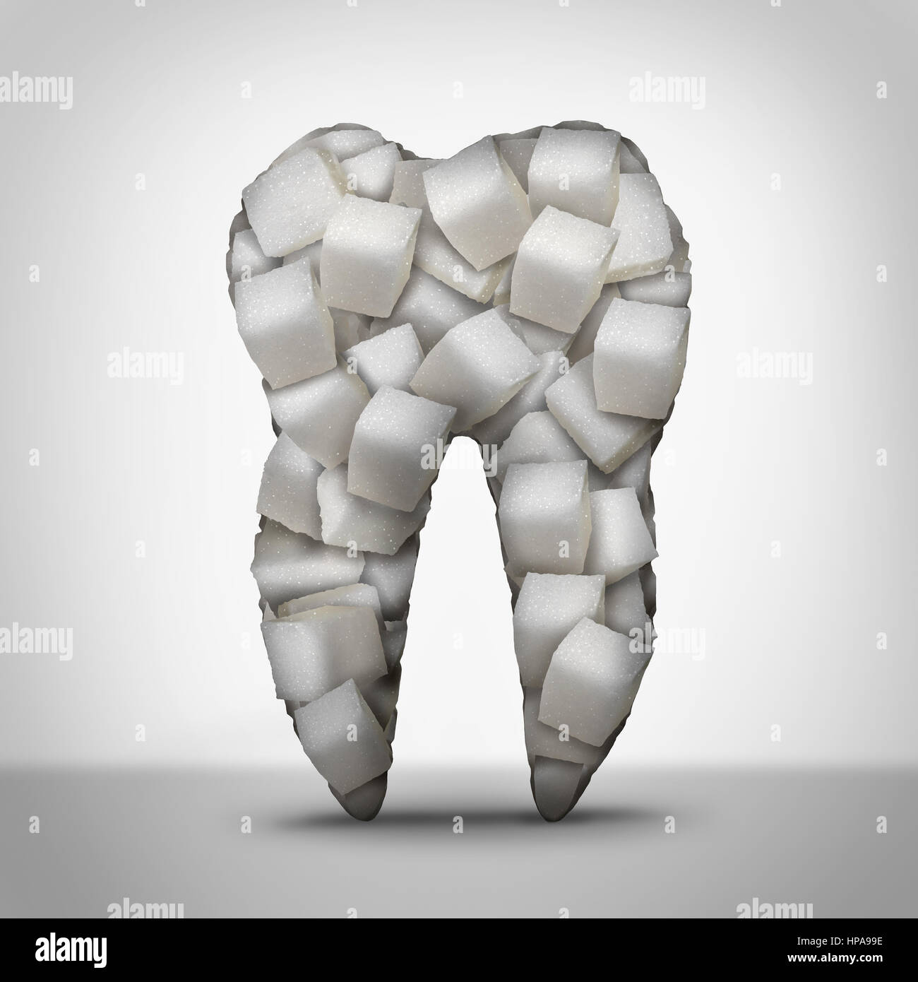Denti di zucchero simbolo del dentista e odontoiatria nozione come un dente molare fatta di cubetti di raffinato bianco candy dolcezza come una cura orale. Foto Stock