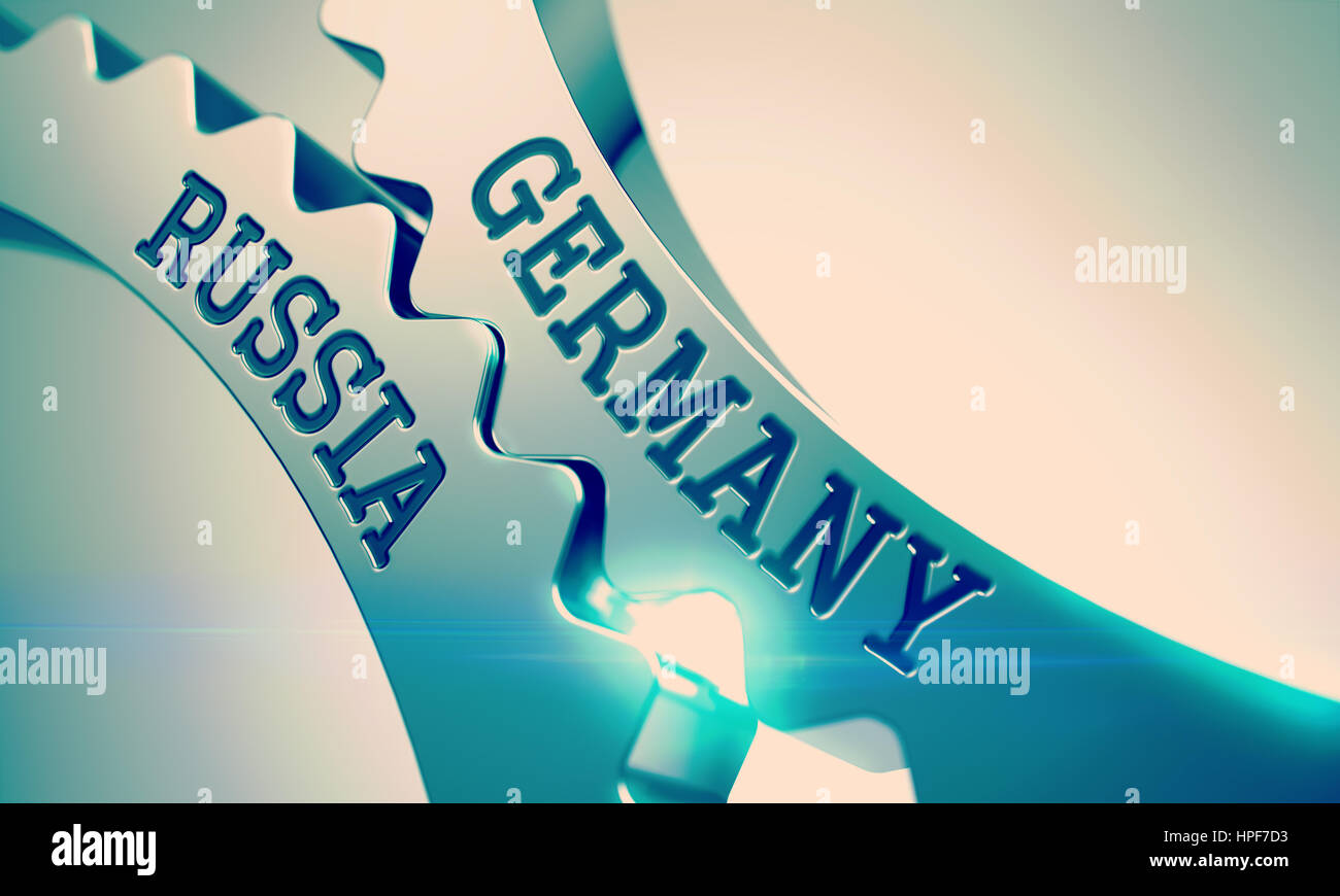 Germania Russia metallo ingranaggi Cog - Concetto di comunicazione. con effetto lente. Germania Russia sul meccanismo di ruote dentate metalliche con brillante effetto luce Foto Stock
