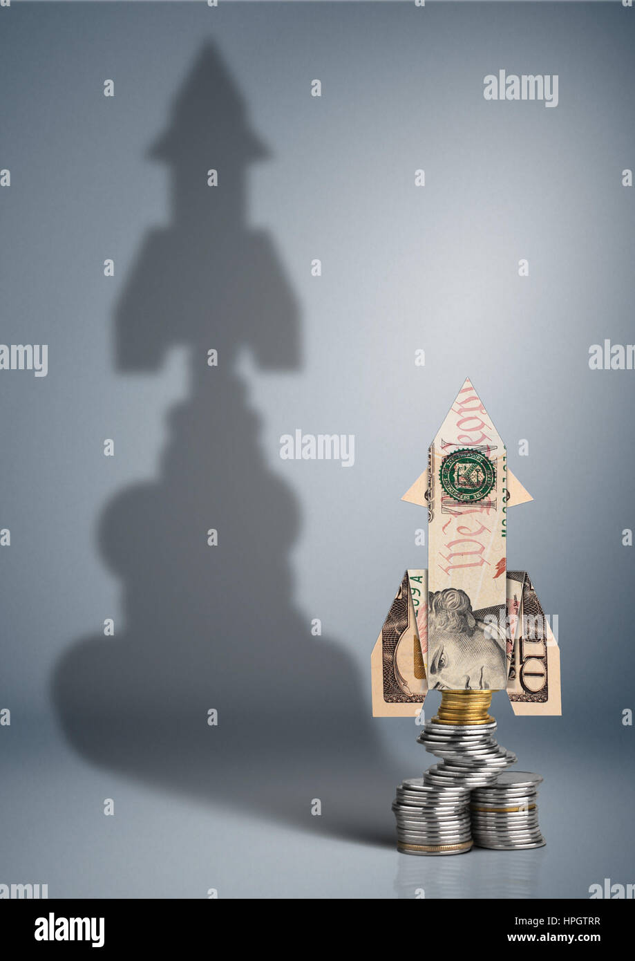 La crescita di profitto concetto, denaro con rucola ombra Foto Stock