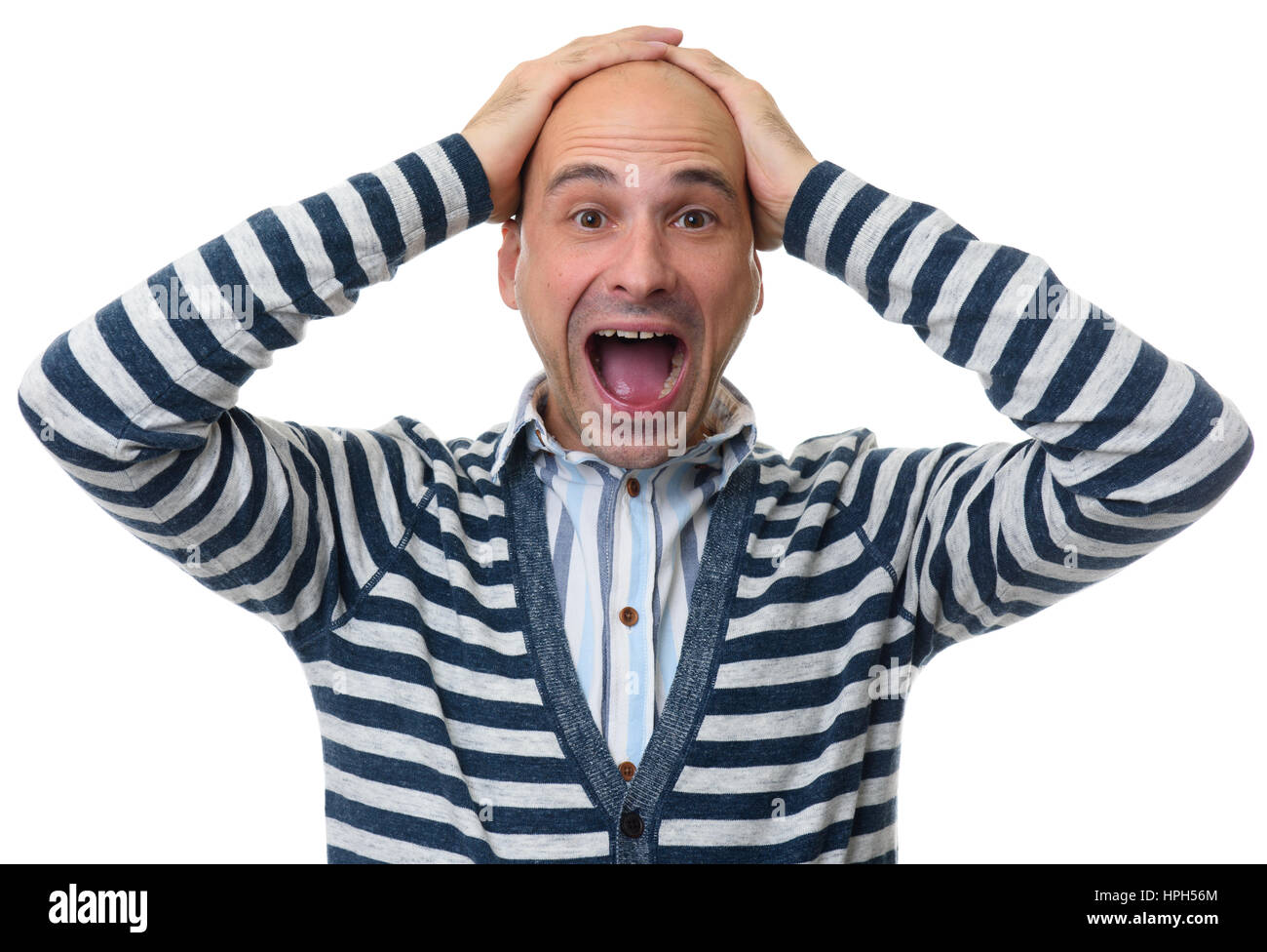 L'uomo sconvolto di pazzia con le sue mani sulla testa. Isolato su bianco. Foto Stock