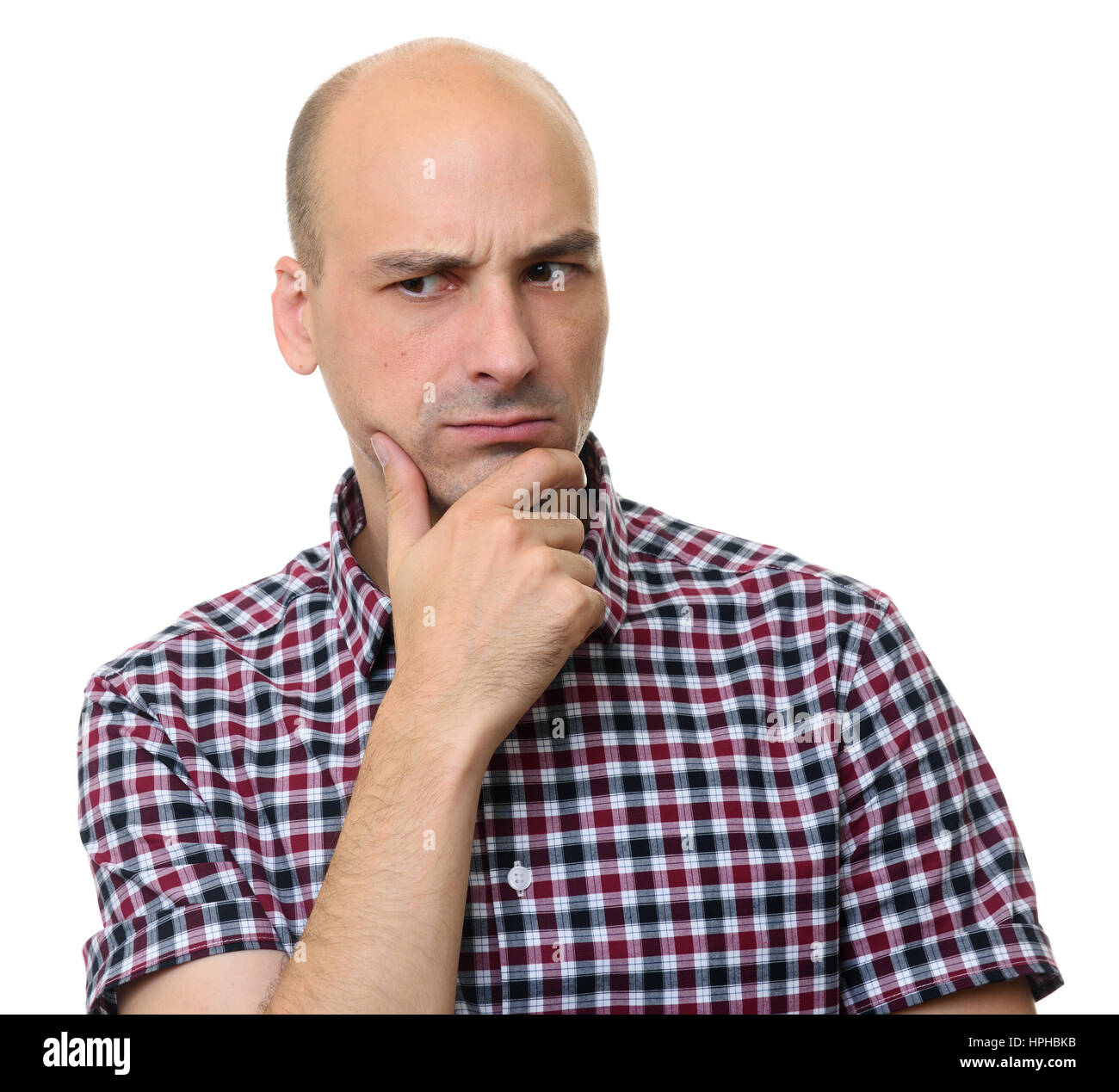 Bella la mezza età uomo pensando a qualcosa con il dito sul mento. Isolato su sfondo bianco. Foto Stock Bella la mezza età uomo pensando a qualcosa con il dito sul mento. Isolato su sfondo bianco. Foto Stock