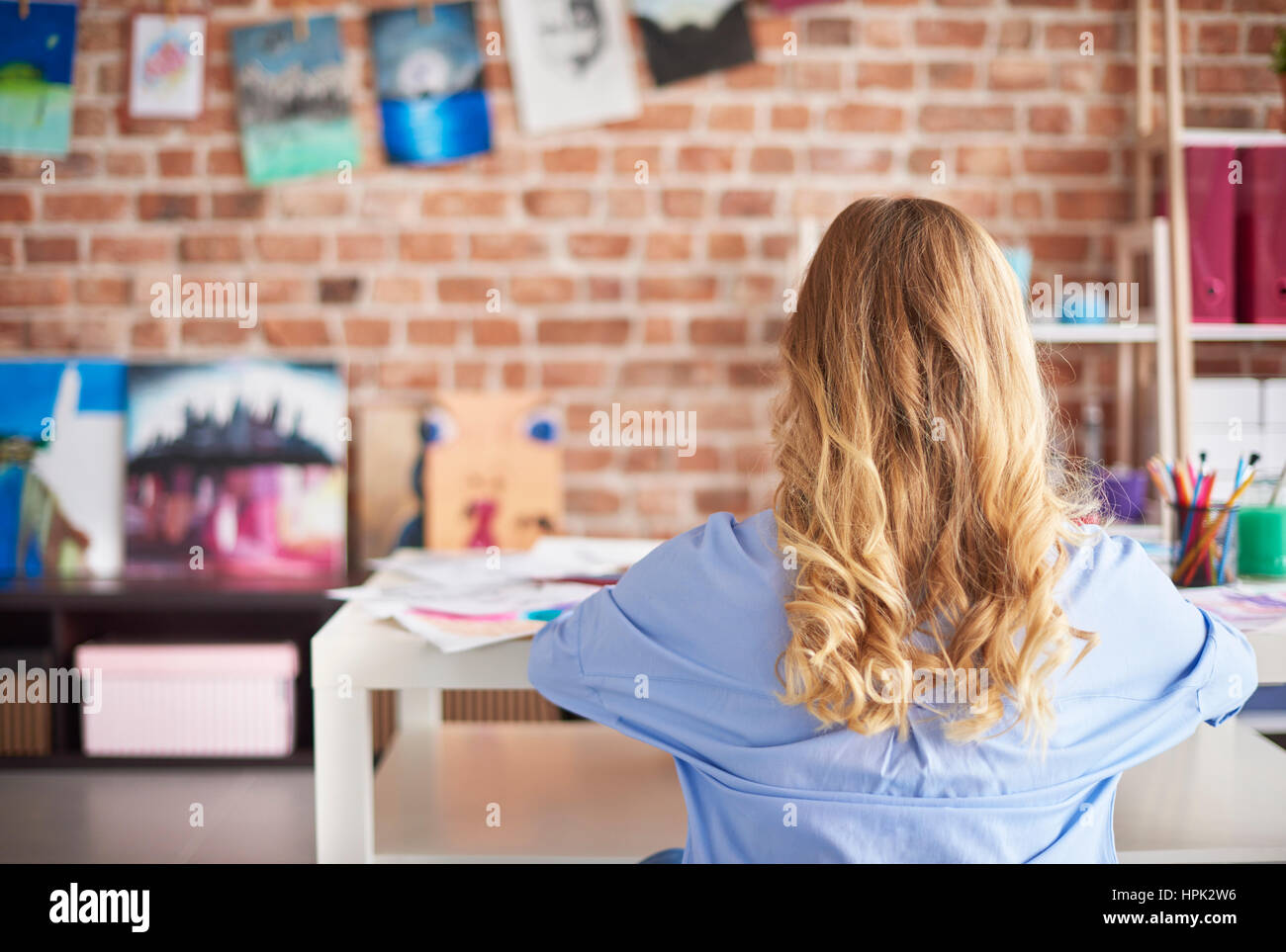 Vista posteriore del lavoro duro donna Foto Stock