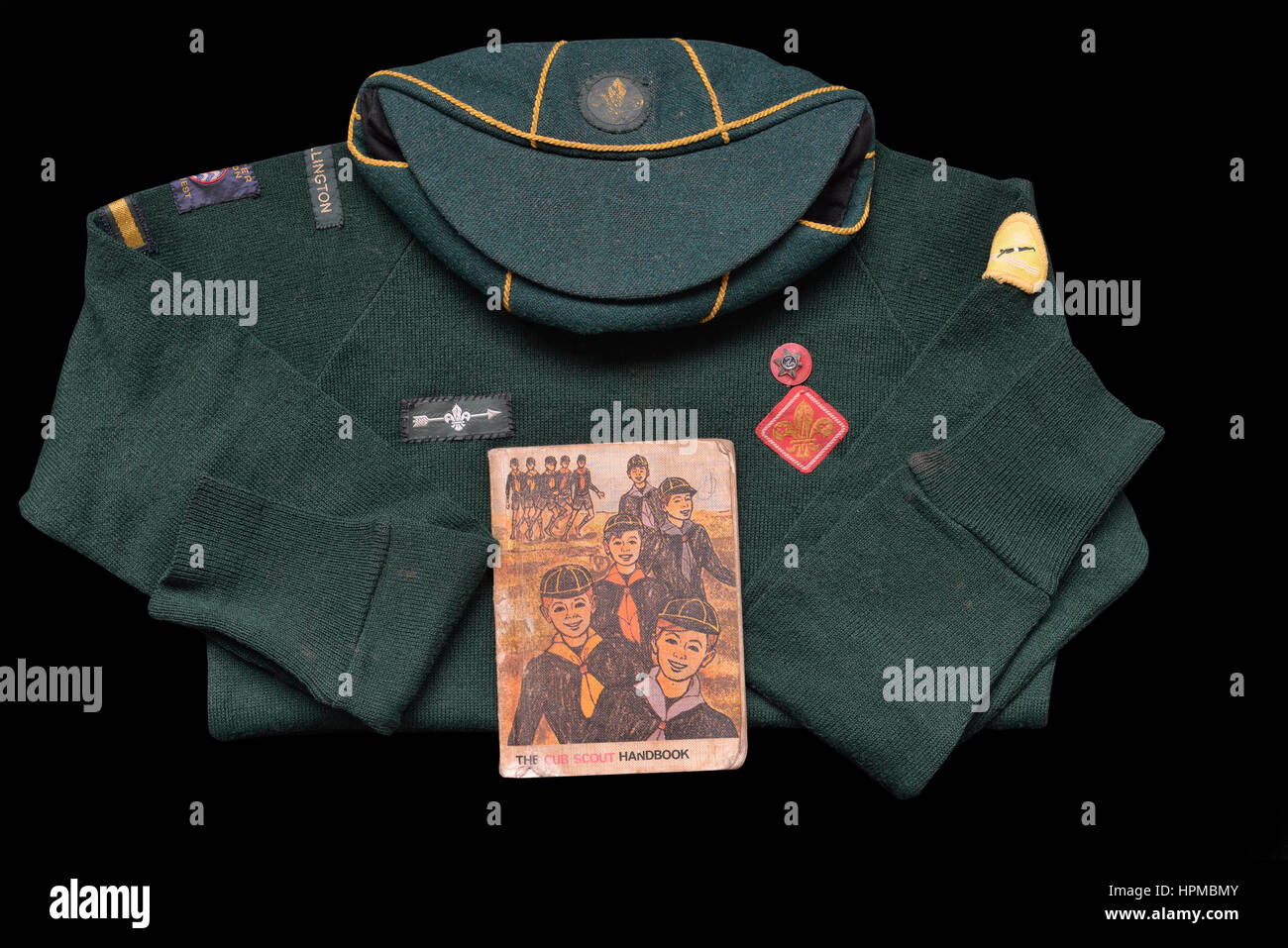 Regno Unito Cub Scout handbook e uniforme di circa settanta Foto Stock