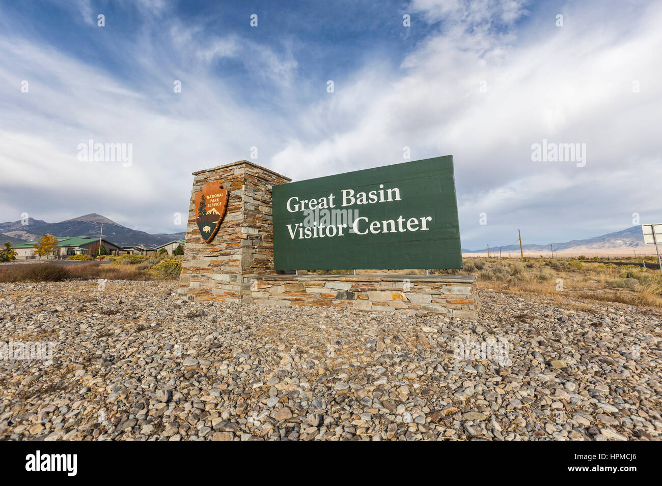 Grande Bacino, Nevada, Stati Uniti d'America - 14 Ottobre 2016: Centro Visitatori segno di entrata al Parco nazionale Great Basin. Foto Stock