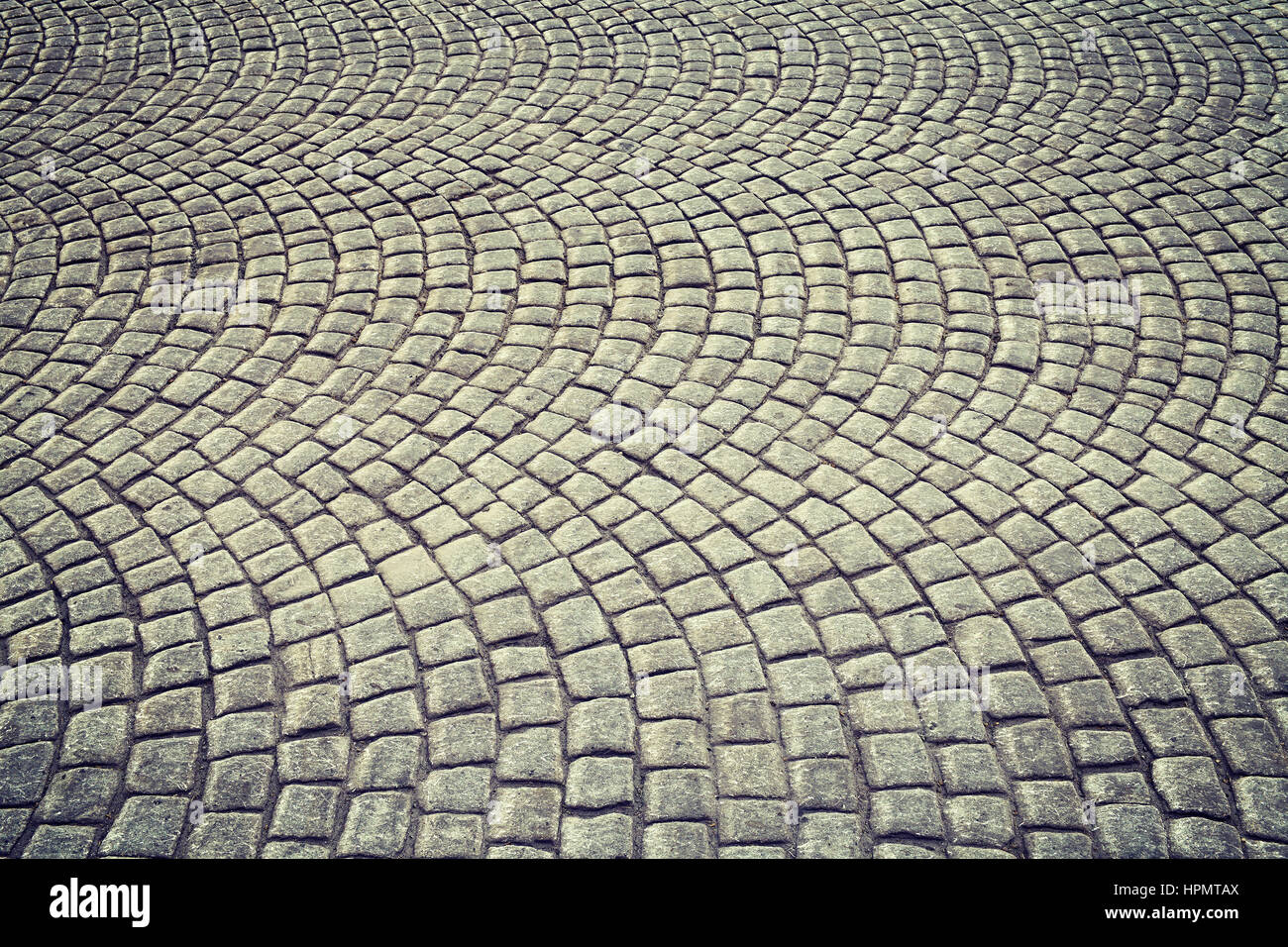 Vintage tonica vecchio cobblestone pavement sfondo. Foto Stock