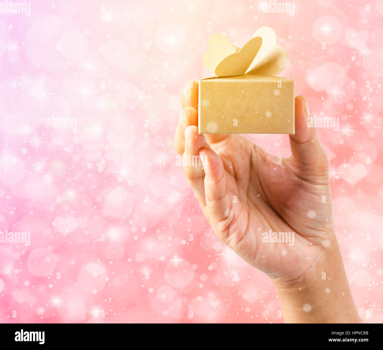 Mani brow confezione regalo con magici effetti speciali luci. Foto Stock