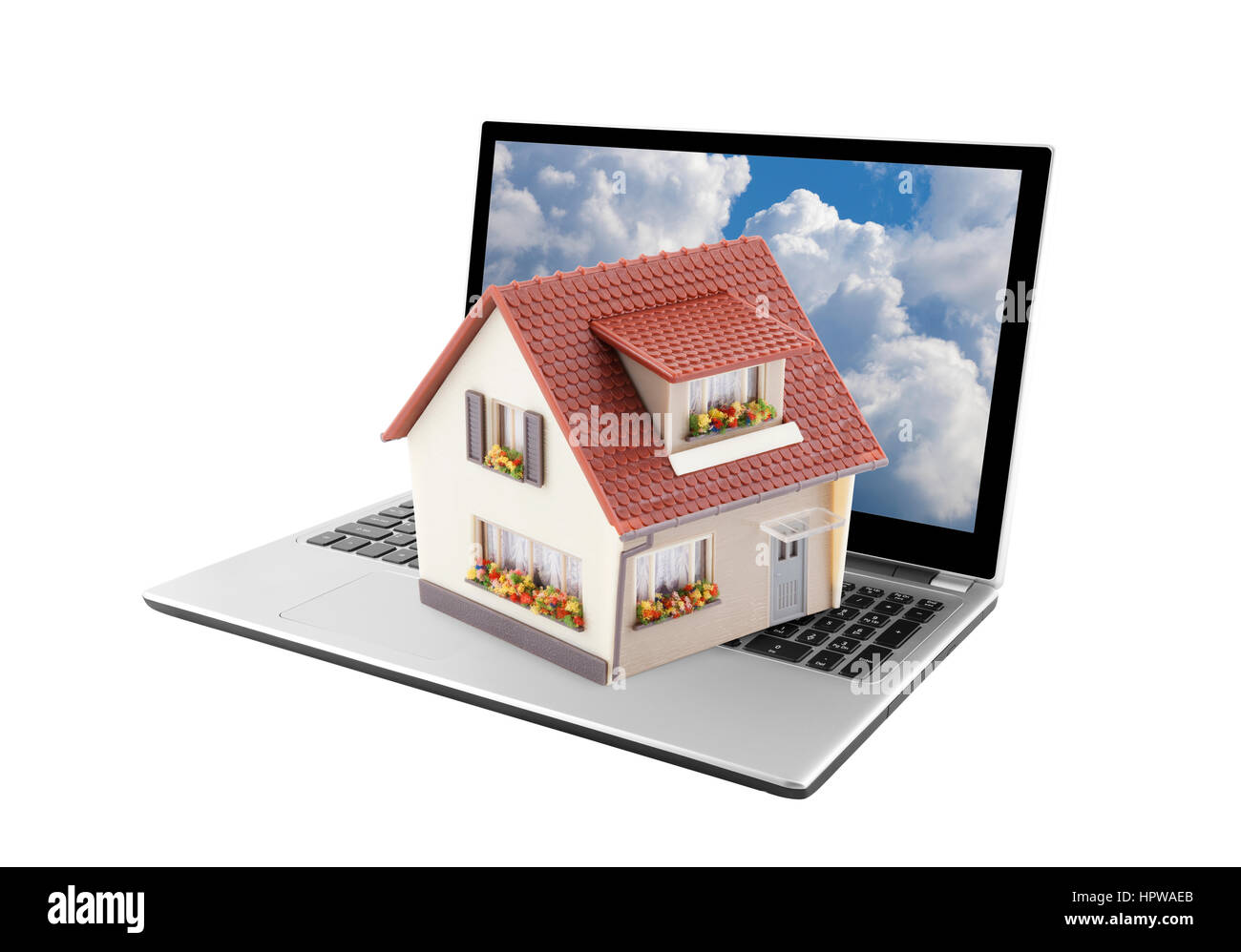 Casa su computer portatile isolato su bianco Foto Stock