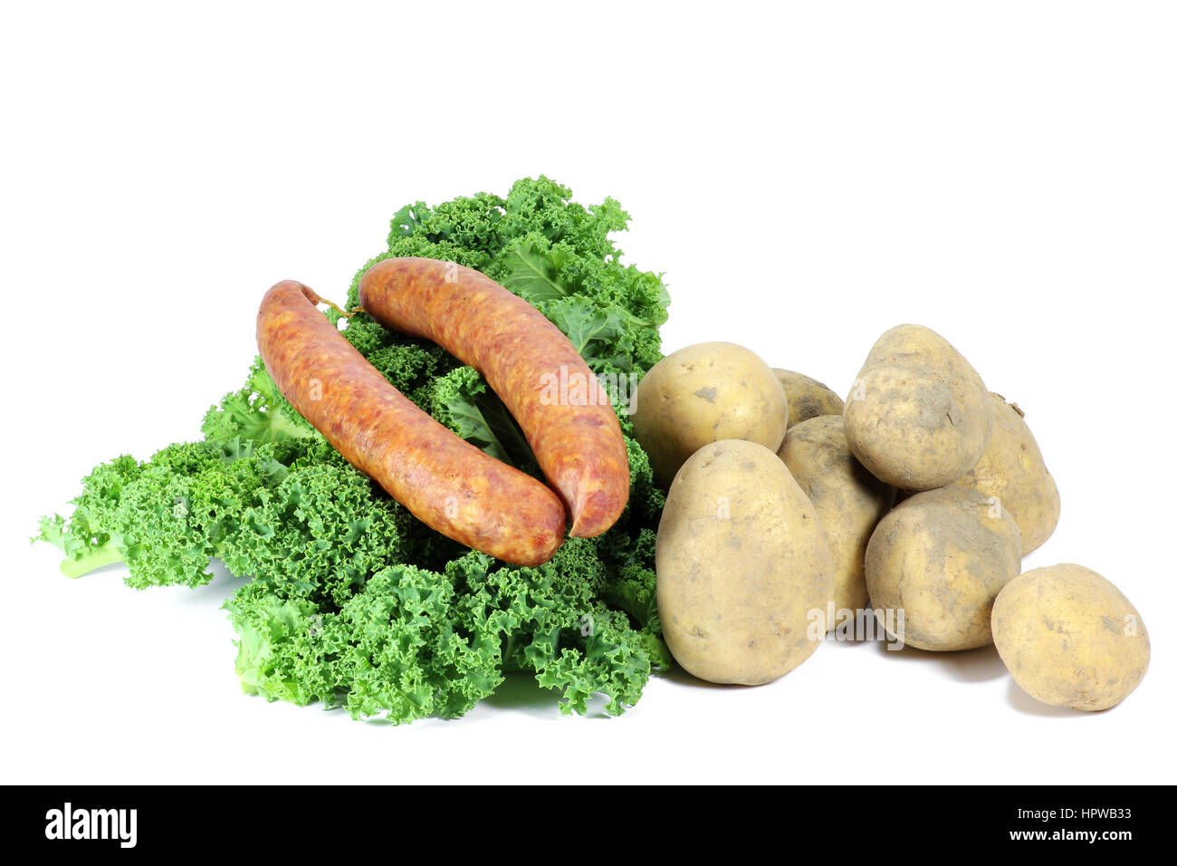 Gli ingredienti di un tradizionale tedesco cavolo riccio pasto isolato su sfondo bianco Foto Stock