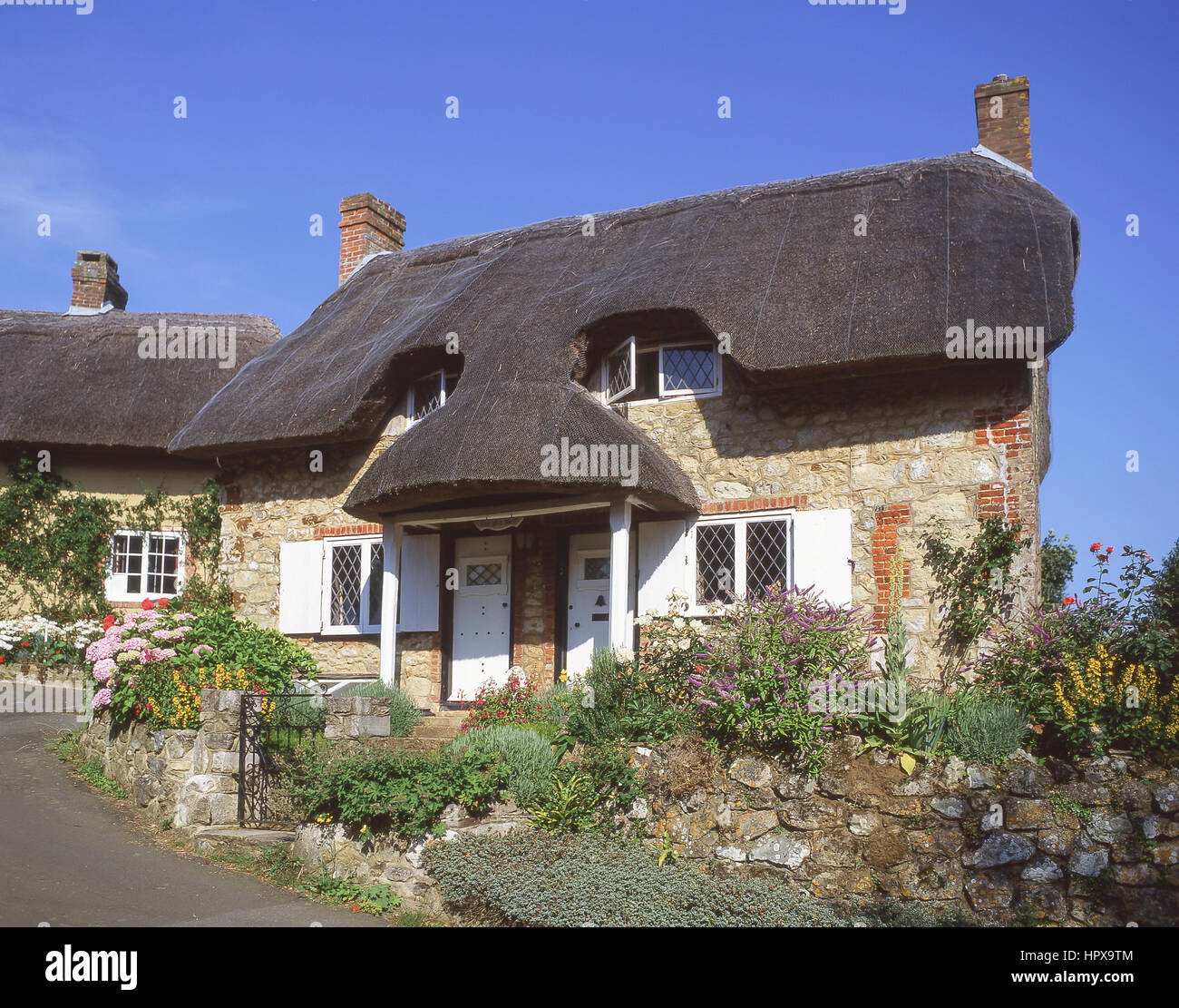 Cottage con il tetto di paglia, villaggio Godshill, Isle of Wight, England, Regno Unito Foto Stock