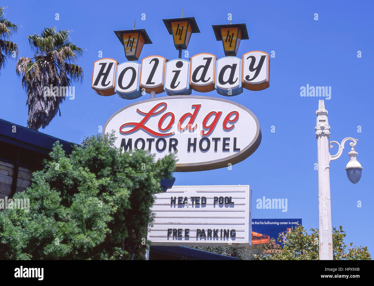 Retrò Holiday Lodge motor inn segno, Miami Beach, Florida, Stati Uniti d'America Foto Stock