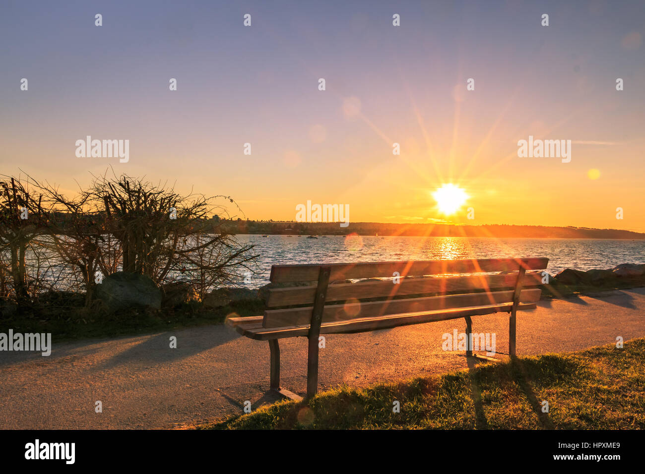 Tramonto di panca Foto Stock