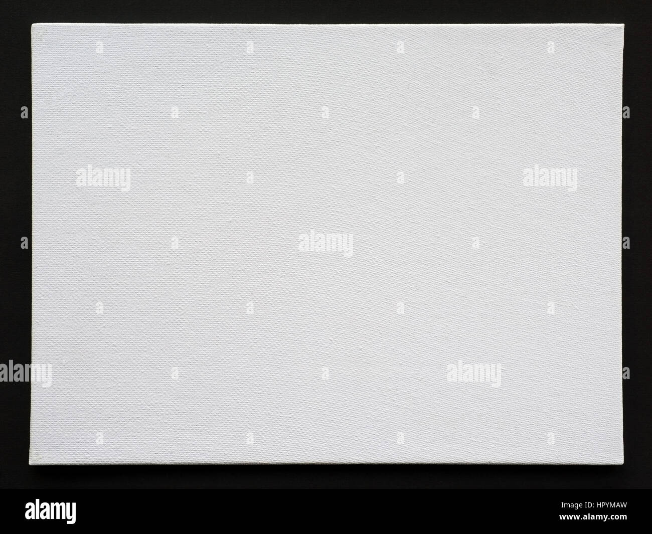 White tela vuota sul telaio di cartone nero. La texture? Sfondo e template Foto Stock