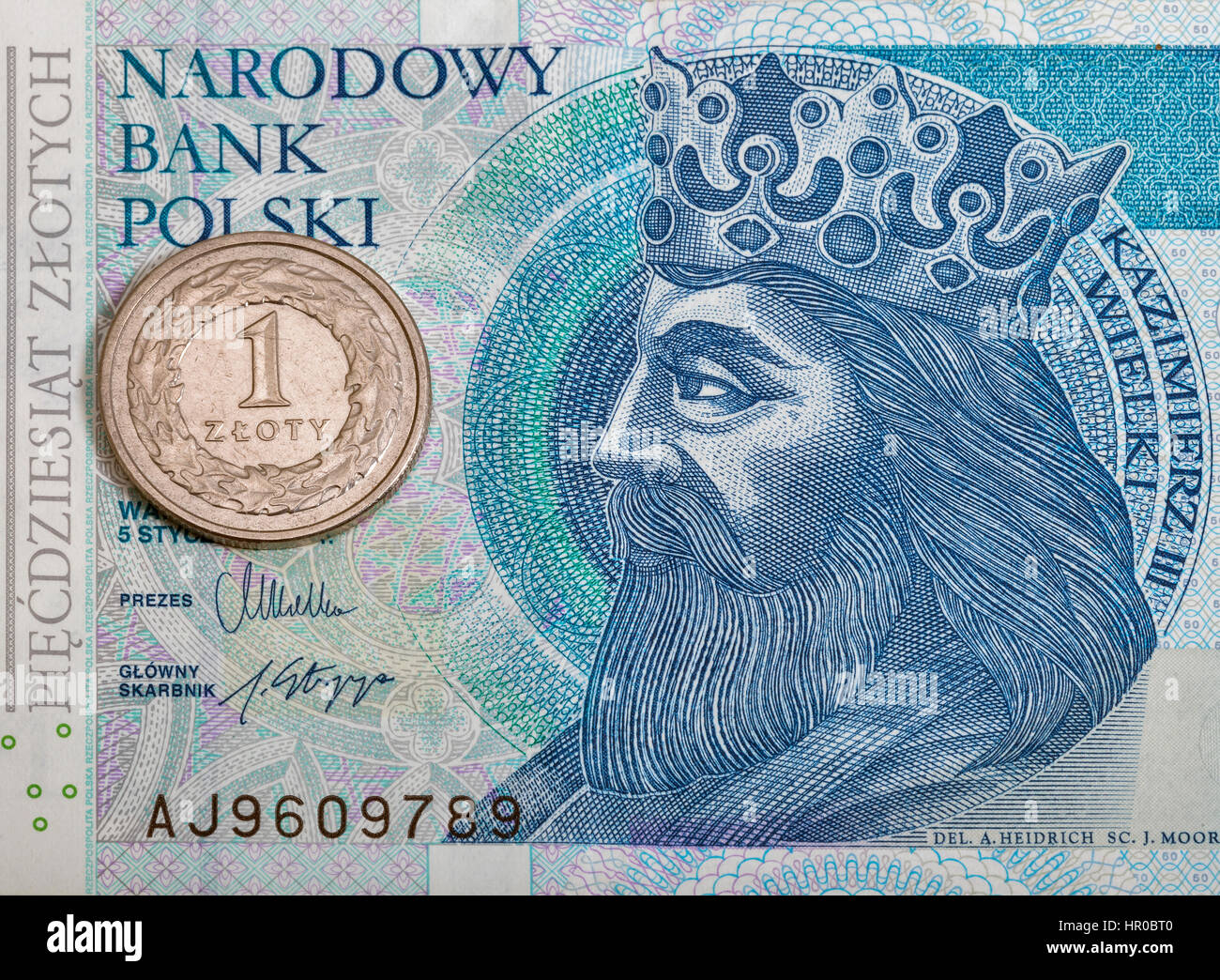 Polish Zloty cinquanta cinquanta delle banconote e delle monete macro Foto Stock