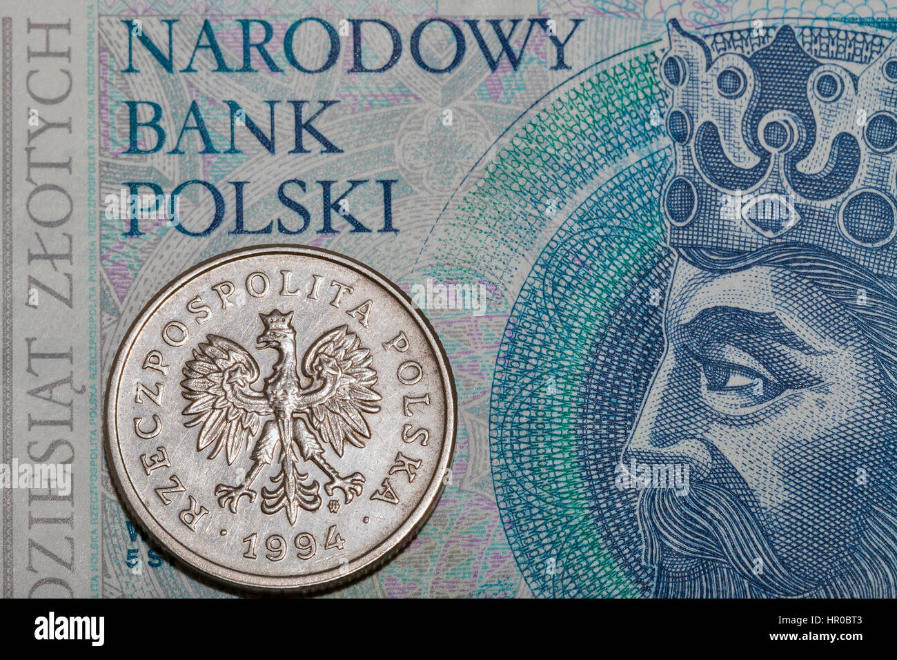 Polish Zloty cinquanta cinquanta delle banconote e delle monete macro Foto Stock