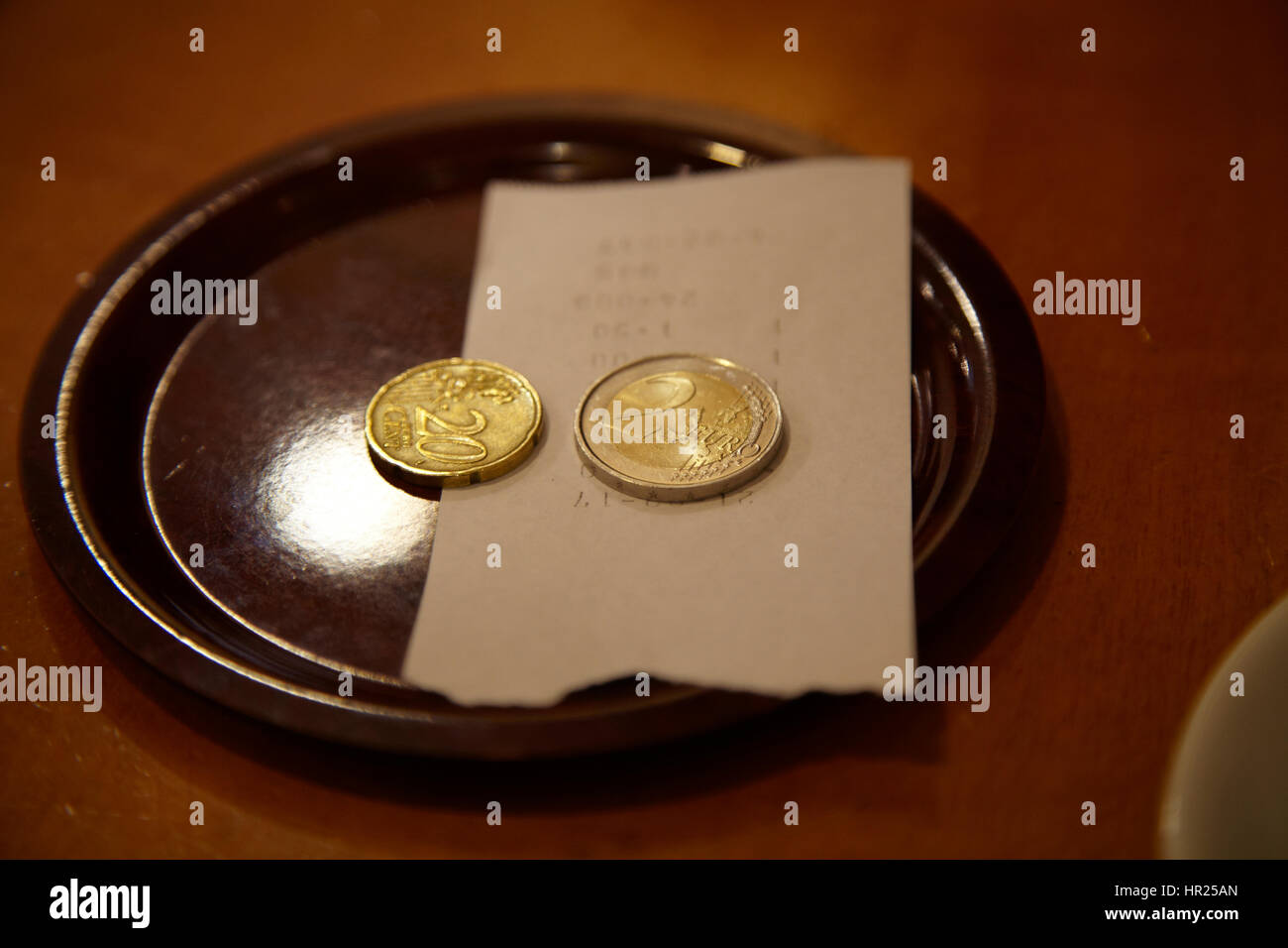 Euro moneta e recipi Foto Stock