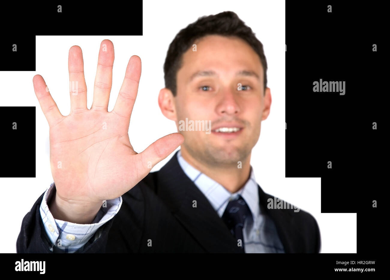 Uomo d'affari che mostra la sua mano su uno sfondo bianco Foto Stock