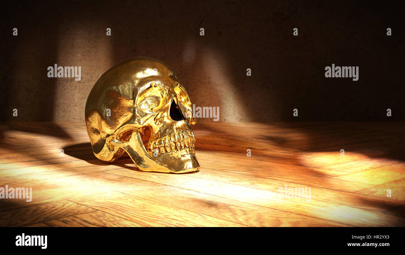 Golden skull su legno Foto Stock