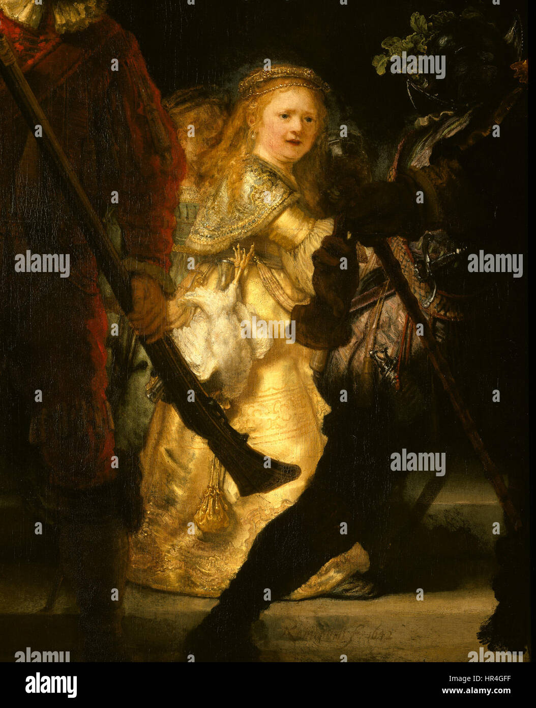 Una sezione dettagliata del famoso dipinto di Rembrandt "la Guardia di notte", incentrata sulle figure e sull'intricato uso di luce e ombra che caratterizzano il capolavoro. Foto Stock
