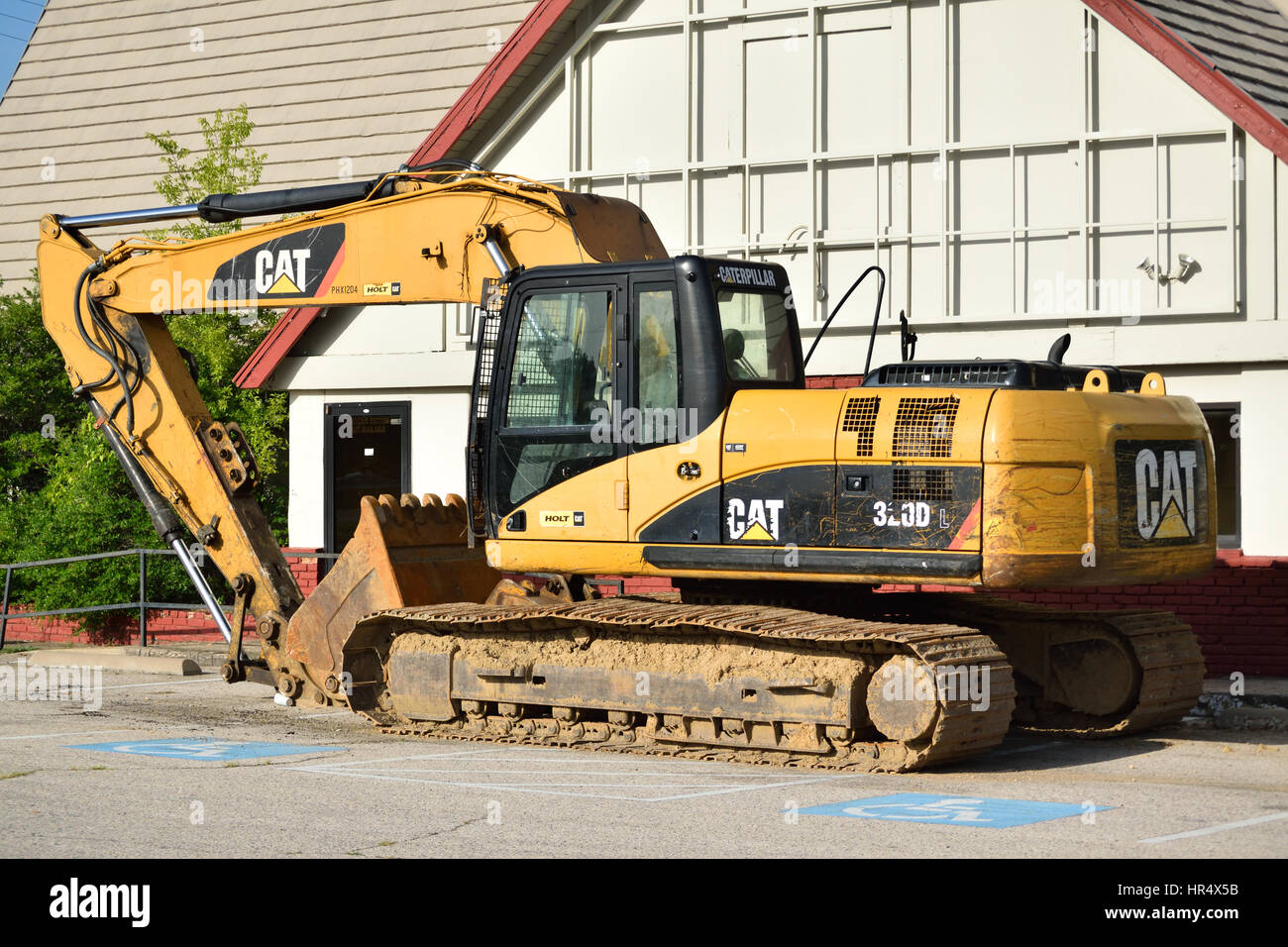 Parcheggiato Caterpillar construction equipment (Digger / escavatore). Foto Stock