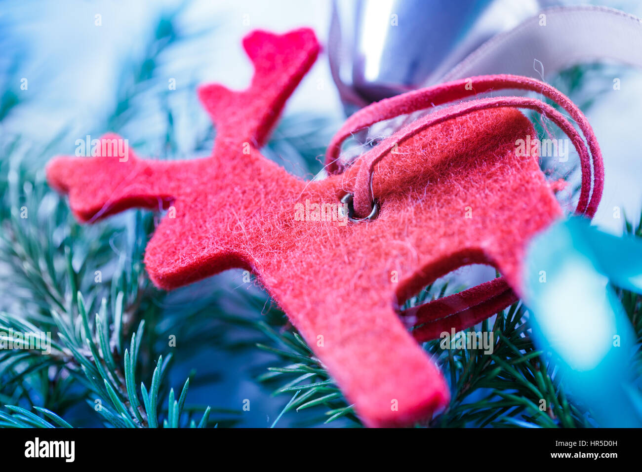 Sfondo di natale con ramo di abete e renne Foto Stock