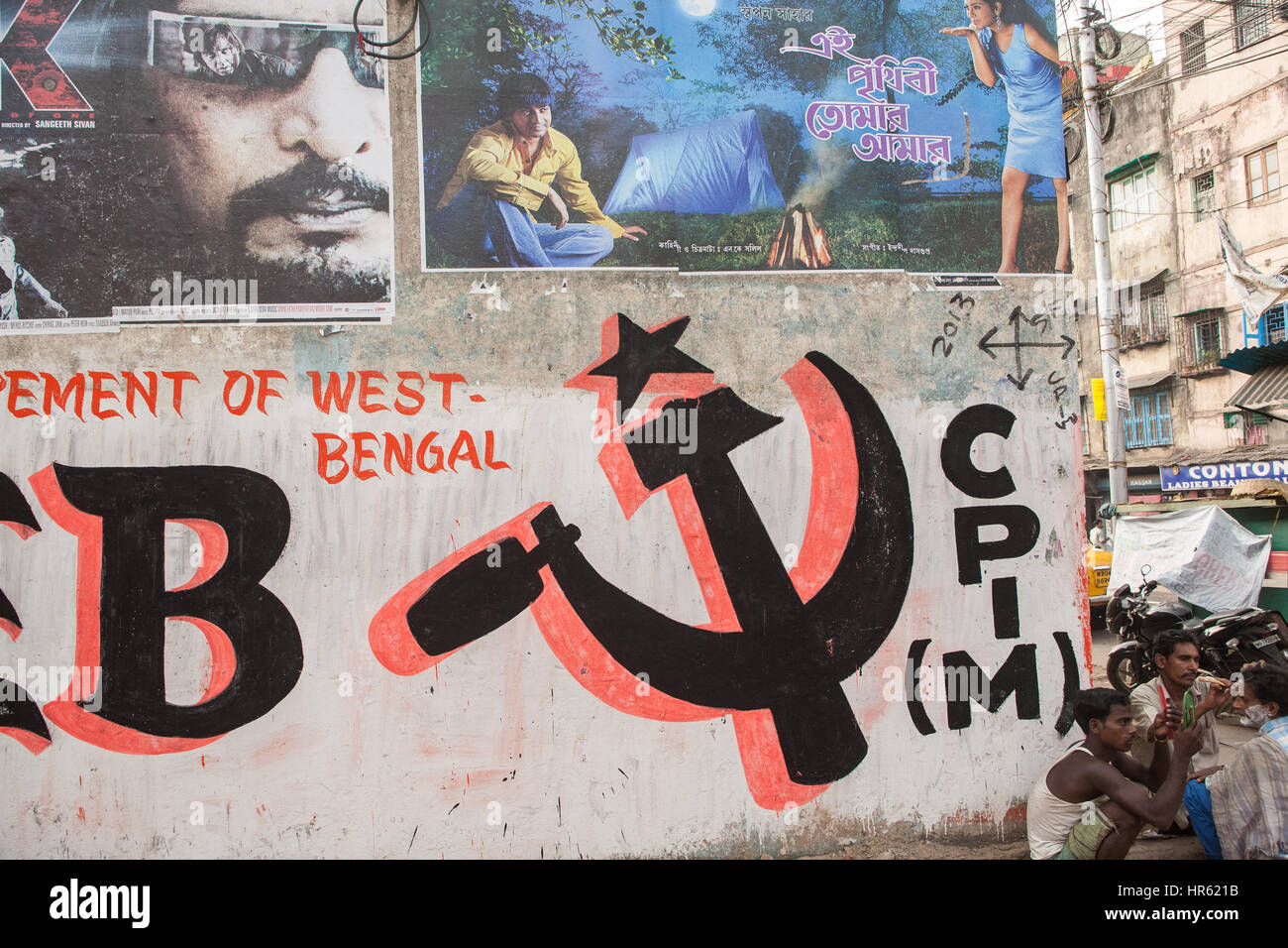 Graffiti,,politico di slogan,a,wall,per,comunista parte,pubblicità,per,elezioni,a,Kolkata,Calcutta,West Bengal,West Bengala,,l'India,Indian,Asia,Asiatico. Foto Stock