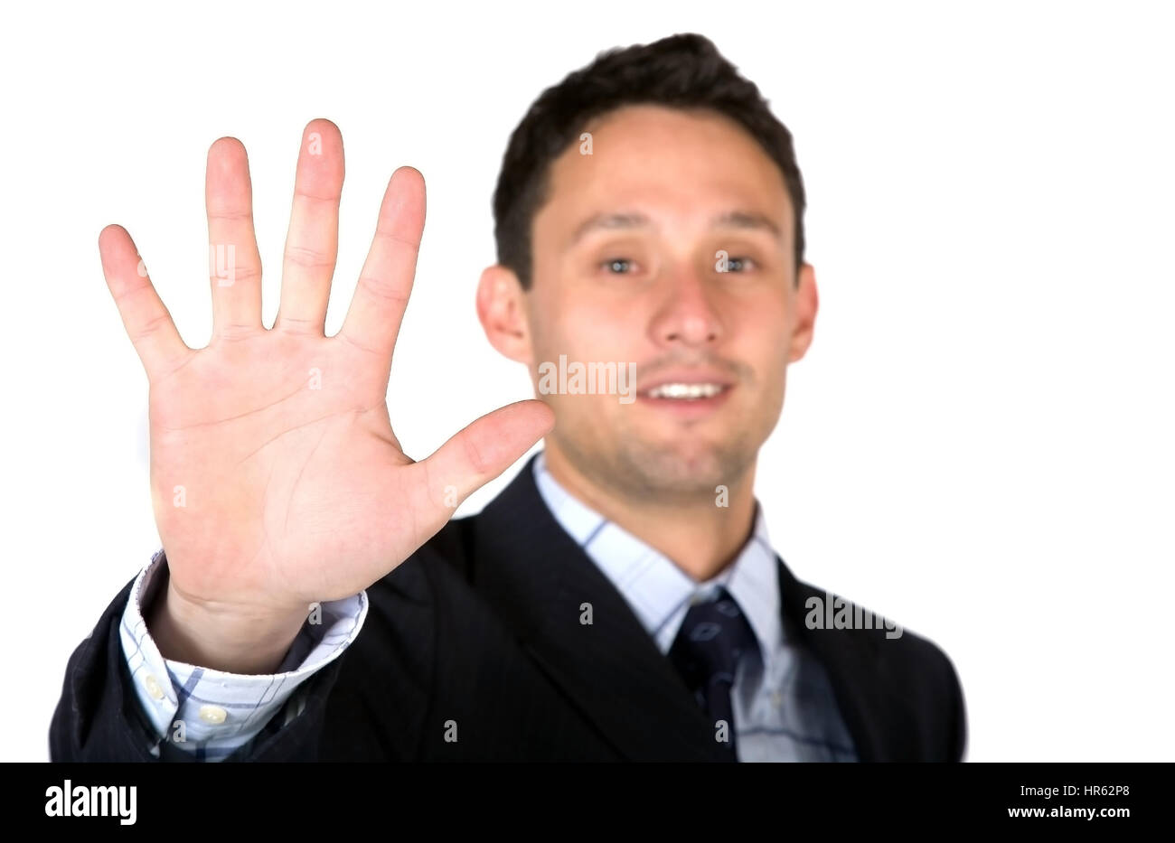 Uomo d'affari che mostra la sua mano su uno sfondo bianco Foto Stock