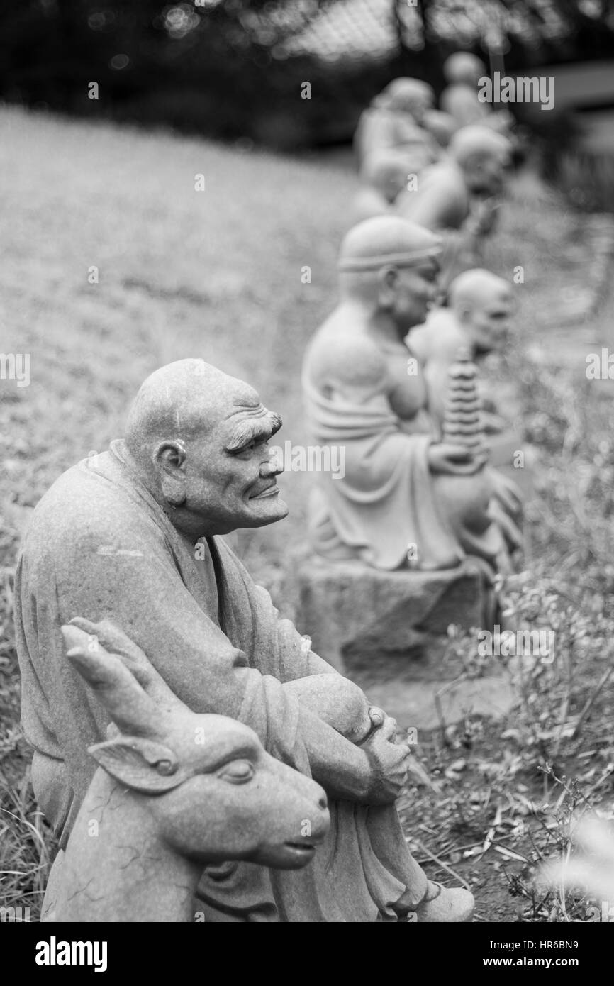 Buddista di statue in pietra Foto Stock