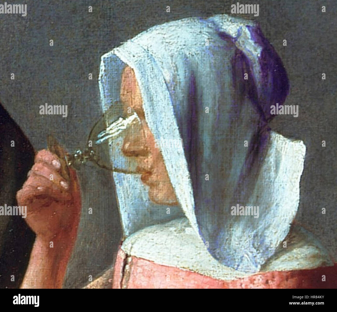 Vermeer Le verre de vin dettaglio de la femme buvant Foto Stock