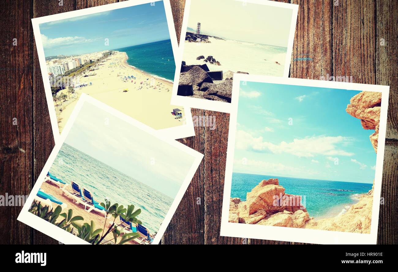 Mucchio di vintage foto dalle vacanze estive con un tradizionale telaio bianco posizionato sulla scrivania in legno. Foto Stock