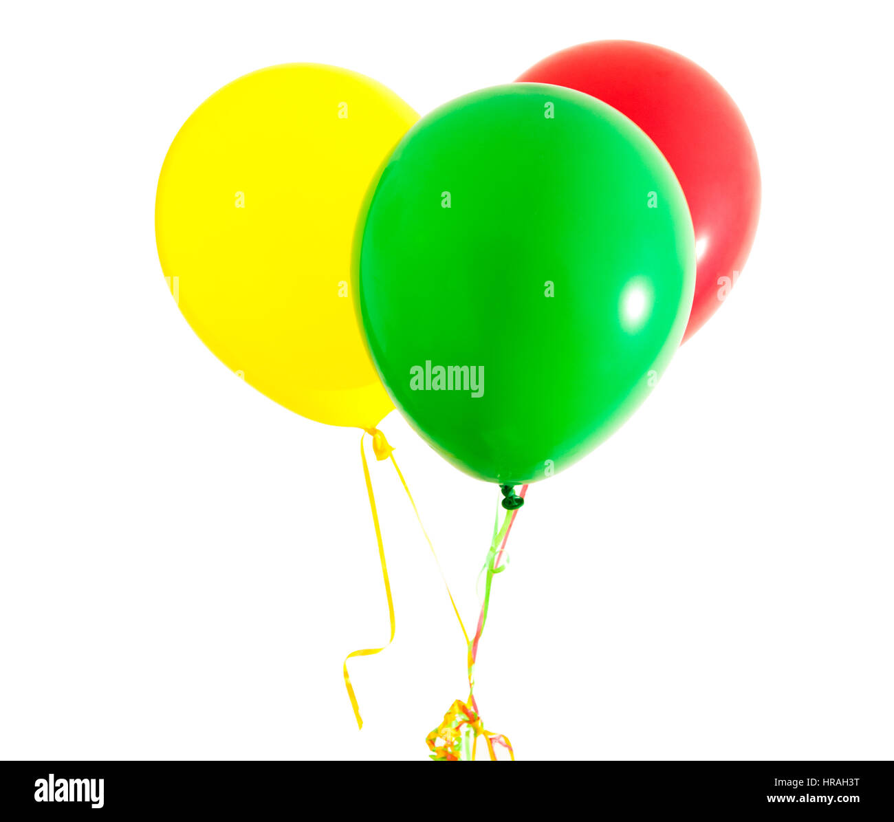 Tre palloncini colorati su nastri Foto Stock