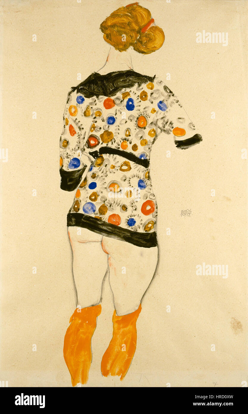 "Standing Woman in a Patterned Blouse" di Egon Schiele rivela l'approccio distintivo dell'artista alla pittura di figura, con enfasi sulla postura espressiva e sugli intricati motivi della camicetta. Il lavoro riflette l'esplorazione di Schiele della forma e dell'emozione nell'arte moderna. Foto Stock