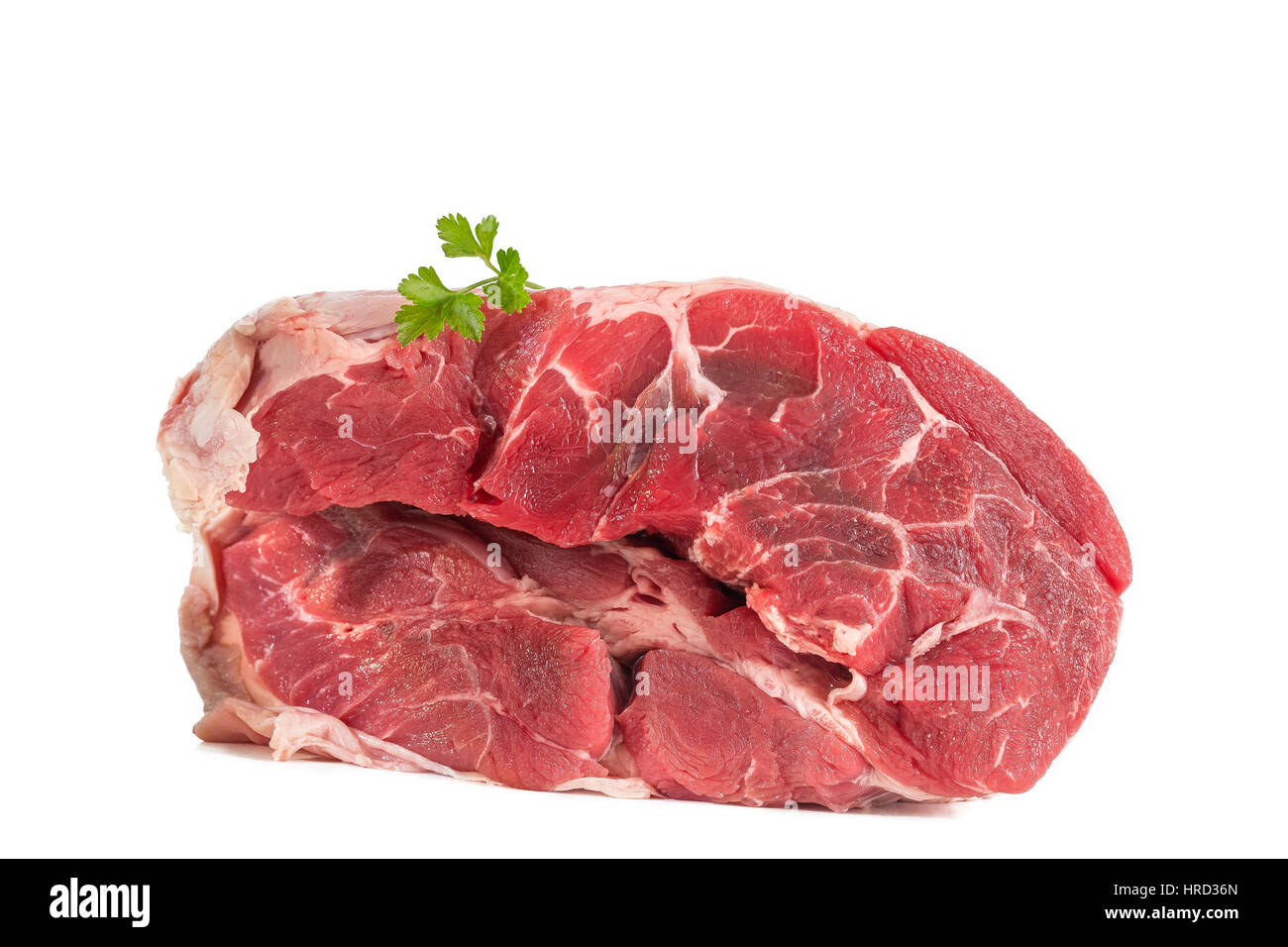 Non cotte stinco di organico della carne di manzo isolato su una lavagna Foto Stock
