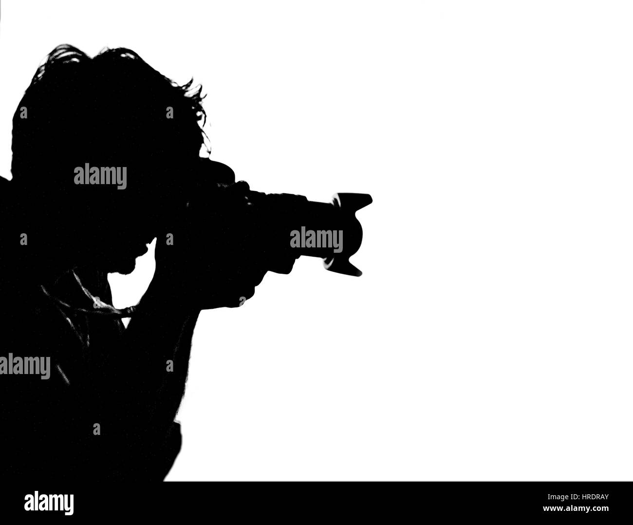 Bianco e nero silhouette vista laterale del fotografo Foto Stock