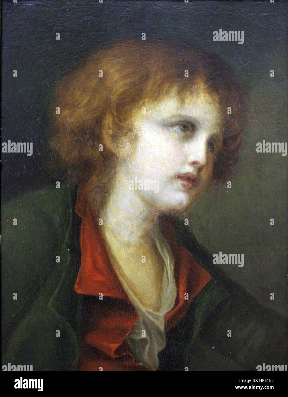 Questo ritratto del 1789 di Geuze raffigura un bambino, incarnando il fascino e l'innocenza tipici della ritrattistica del tardo XVIII secolo. L'opera riflette il delicato approccio del pittore alla cattura dell'espressione giovanile. Foto Stock