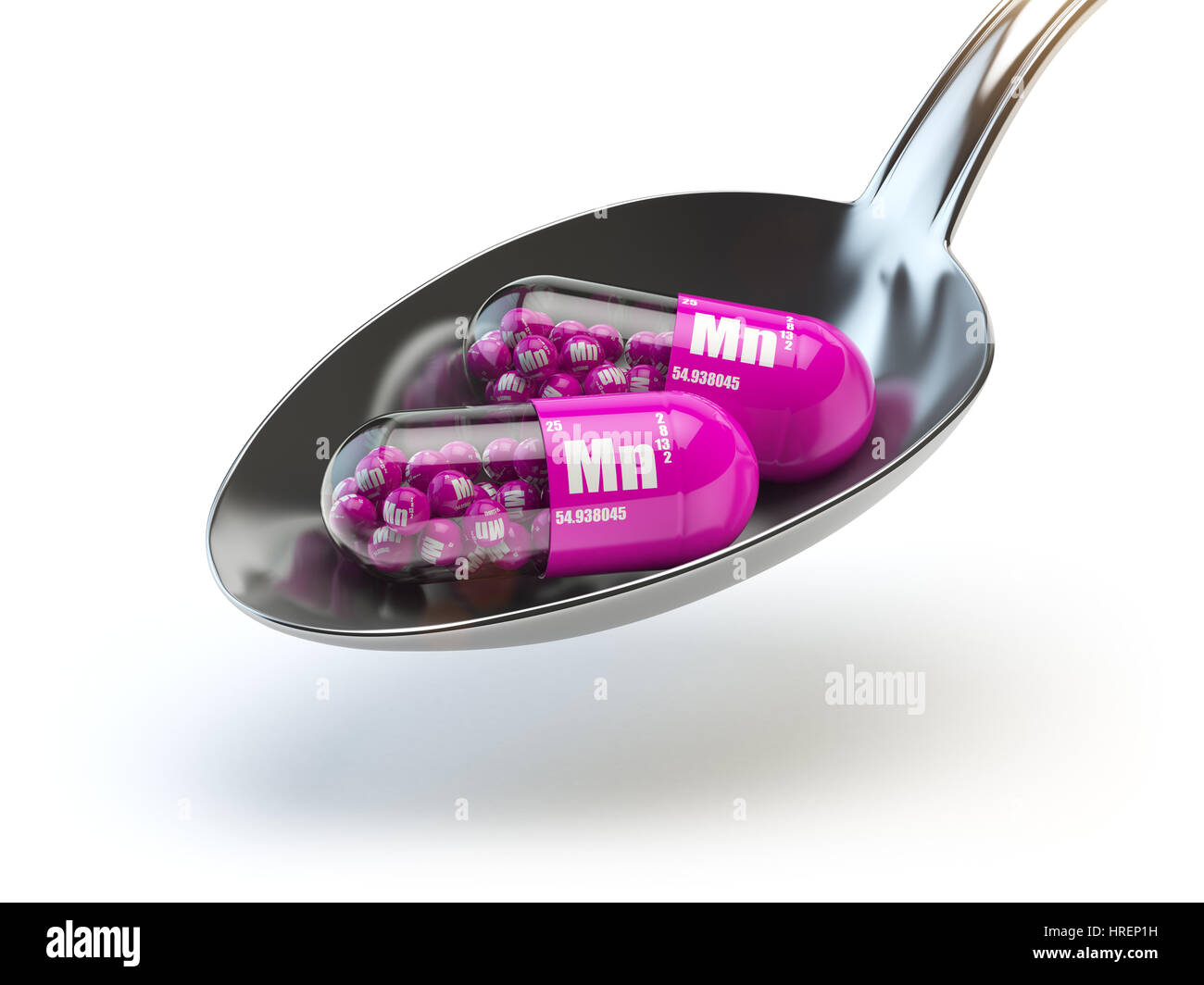 Pillole con manganese MN elemento del cucchiaio. Integratori alimentari. Vitamina capsule. 3d illustrazione Foto Stock