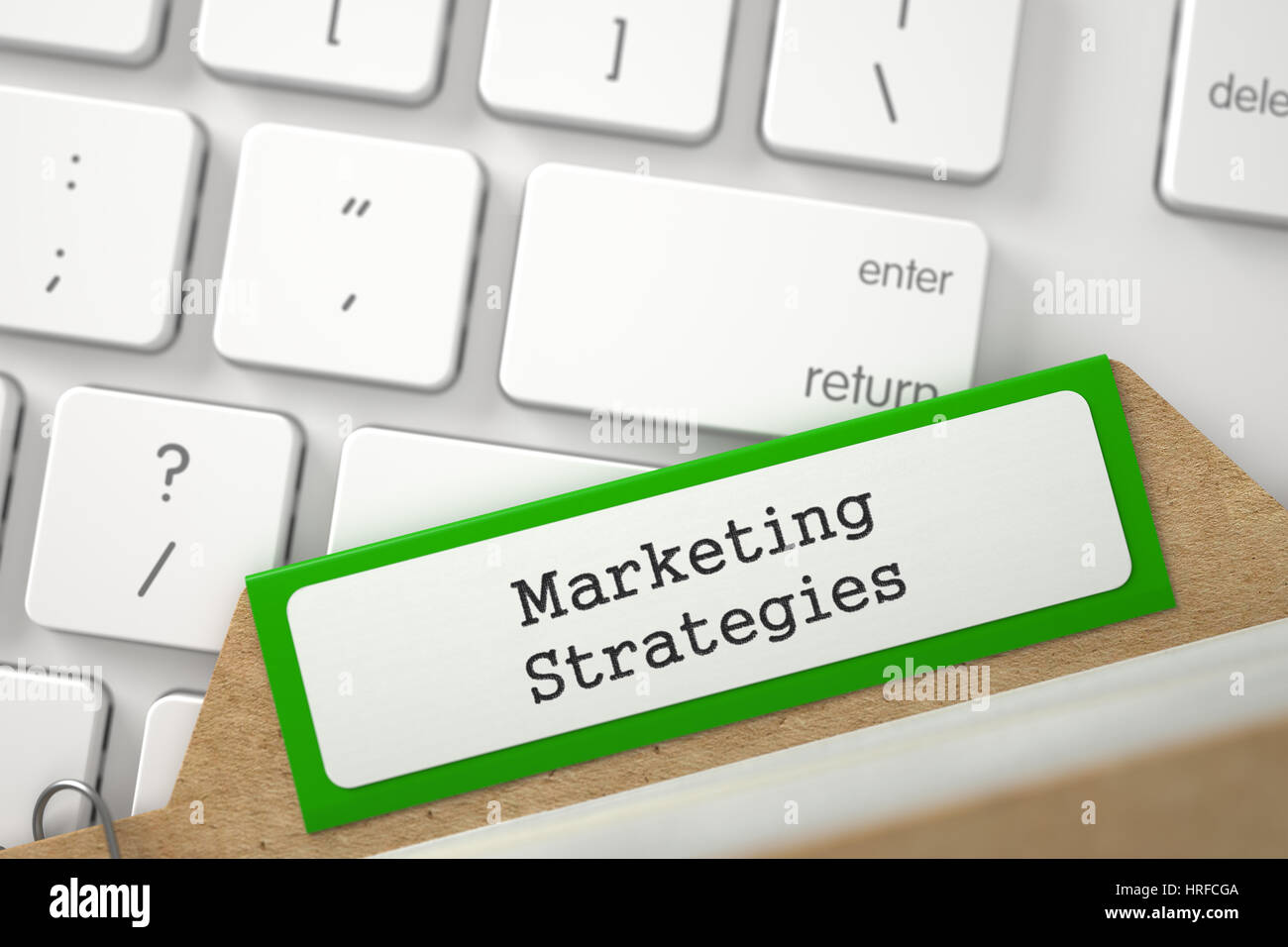 Strategie di marketing. Archivio verde Segnalibri di scheda Indice su sfondo bianco del tastierino moderno. Il concetto di business. Primo piano. Immagine sfocata. 3D ri Foto Stock